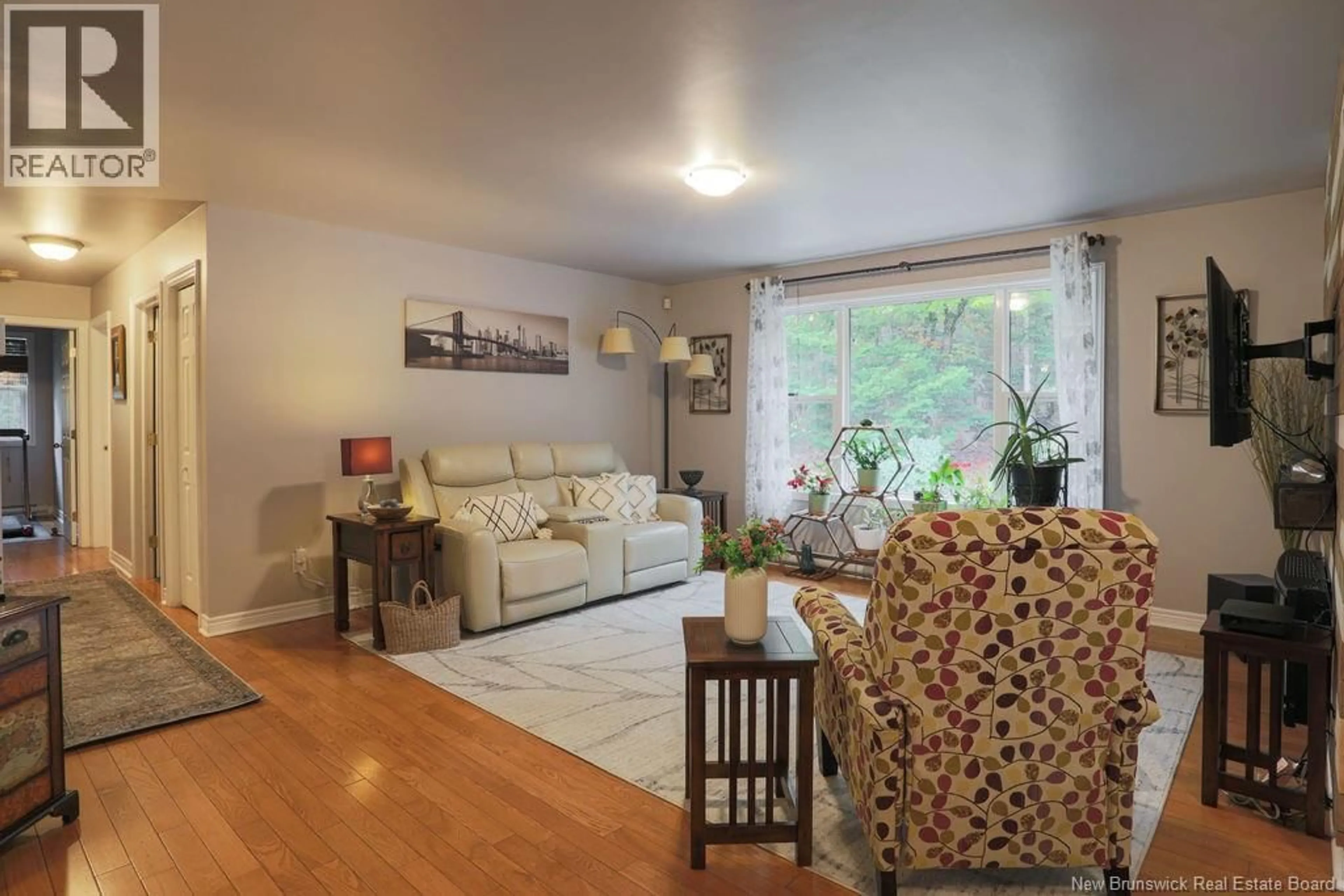 Living room with furniture, wood/laminate floor for 25 SPRING GARDEN ROAD, Saint John New Brunswick E2K1N4