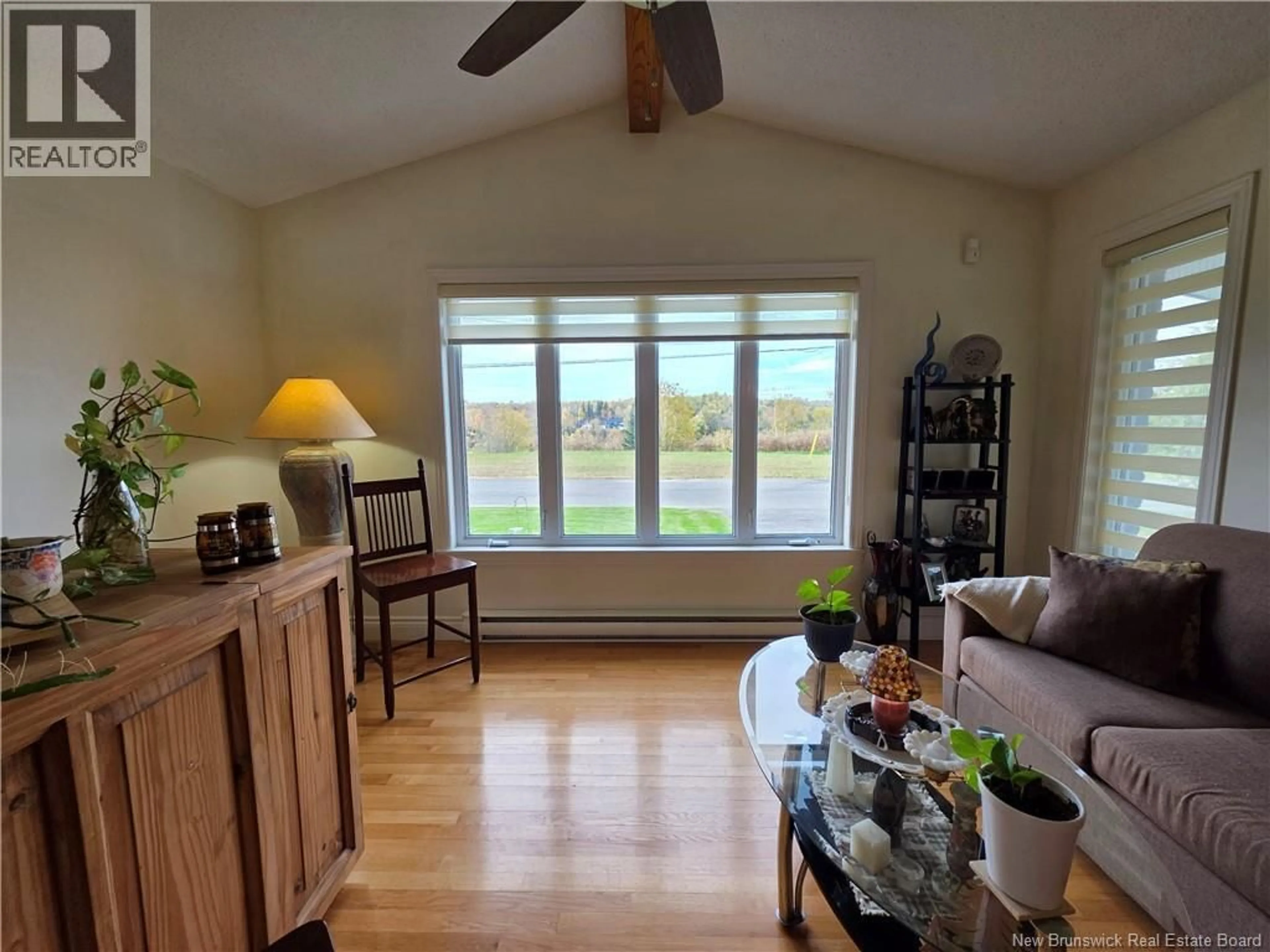 Living room with furniture, wood/laminate floor for 384 TAYLOR STREET, Grand Falls New Brunswick E3Y3V9