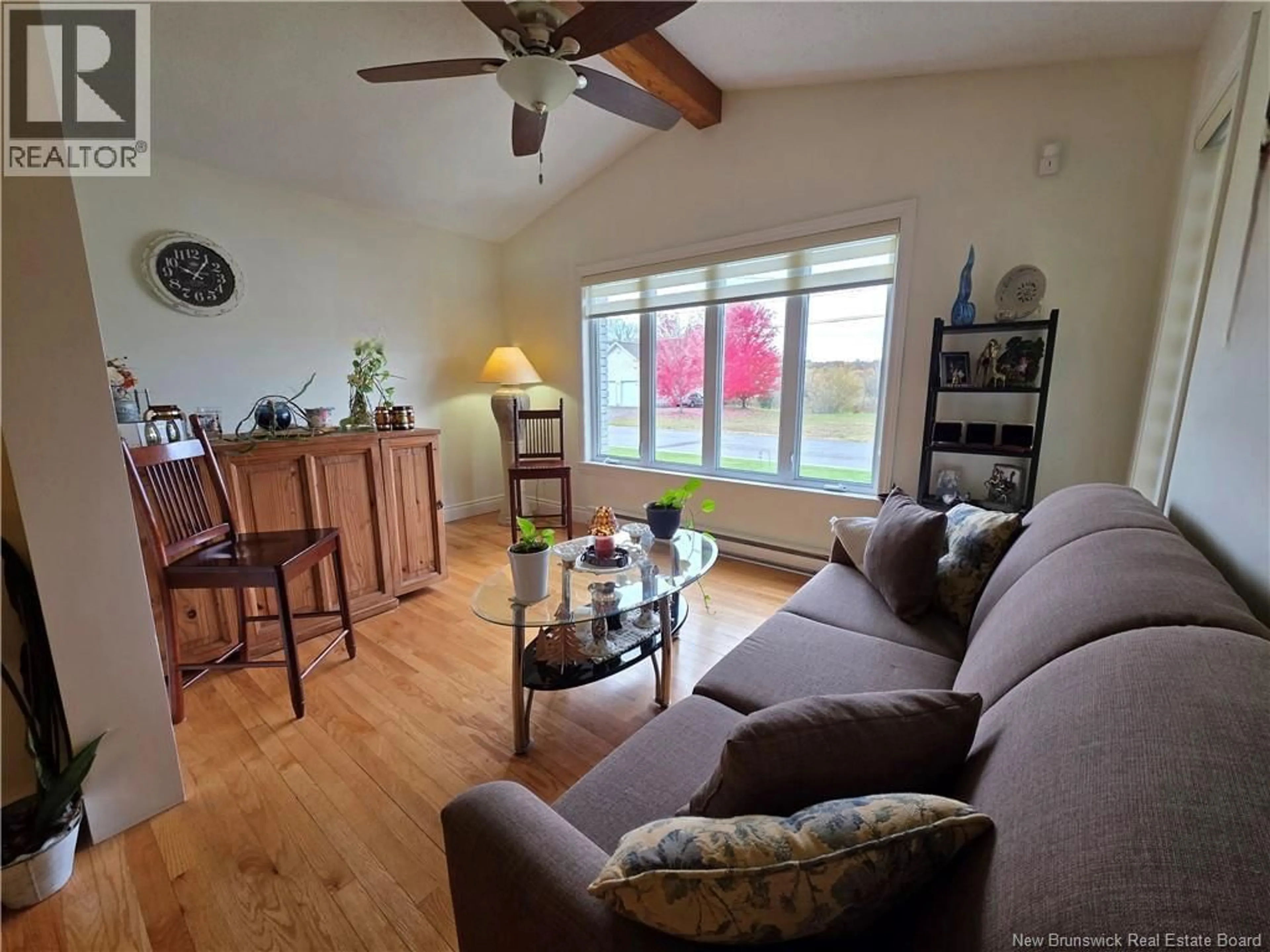 Living room with furniture, wood/laminate floor for 384 TAYLOR STREET, Grand Falls New Brunswick E3Y3V9