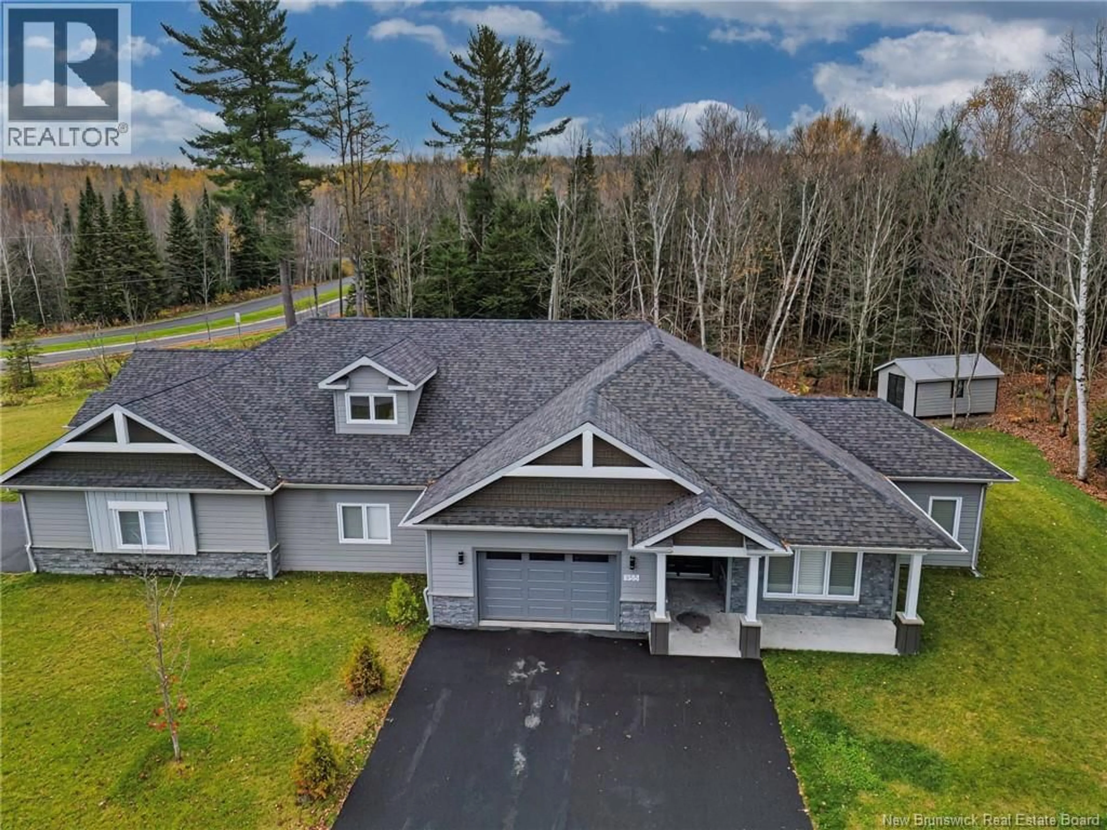 A pic from outside/outdoor area/front of a property/back of a property/a pic from drone, mountain view for 955 MAIN STREET, Grand Falls New Brunswick E3Z2W3