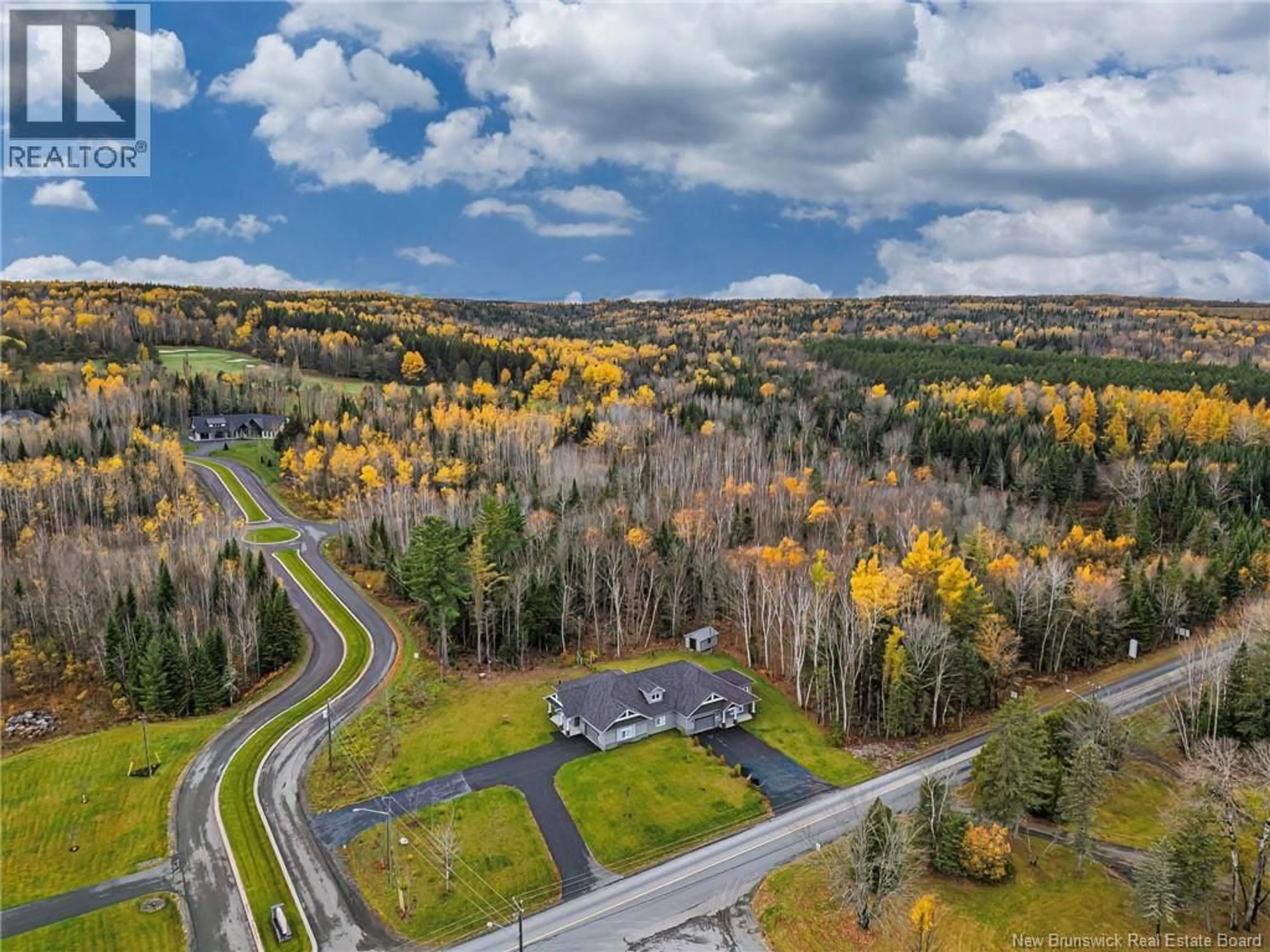 A pic from outside/outdoor area/front of a property/back of a property/a pic from drone, forest/trees view for 955 MAIN STREET, Grand Falls New Brunswick E3Z2W3