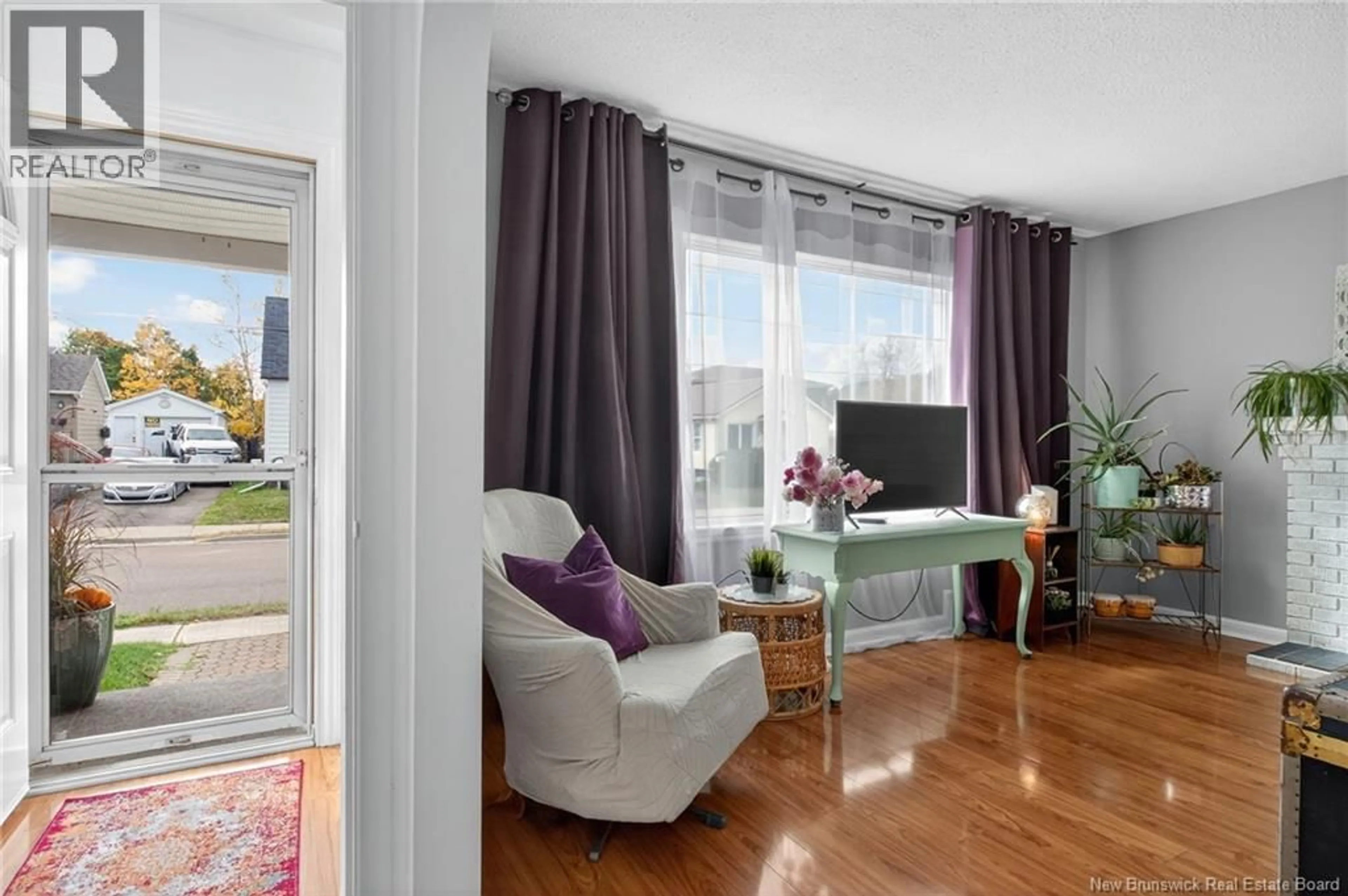 Living room with furniture, wood/laminate floor for 473 HIGH STREET, Moncton New Brunswick E1C6E3