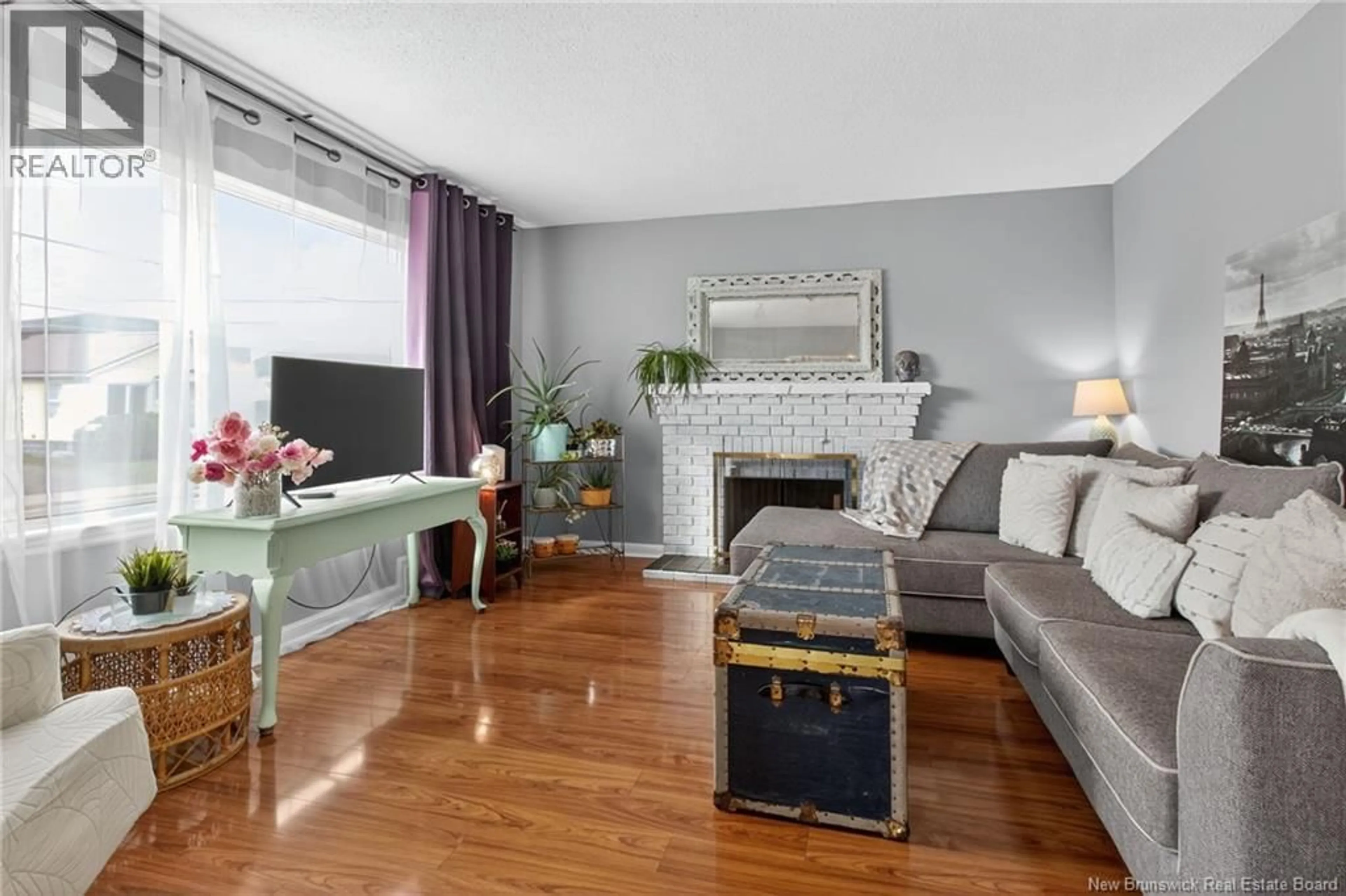 Living room with furniture, wood/laminate floor for 473 HIGH STREET, Moncton New Brunswick E1C6E3