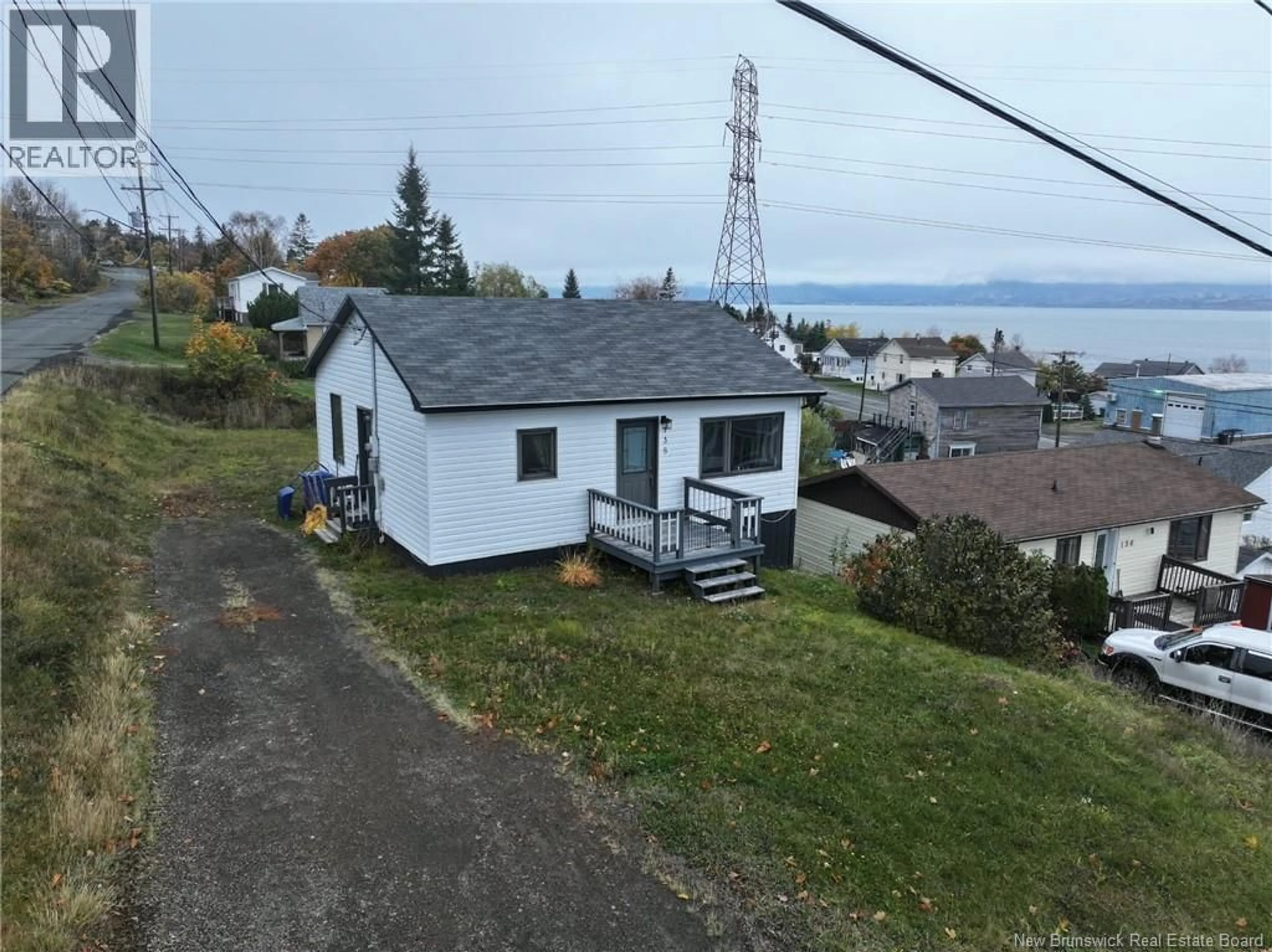 A pic from outside/outdoor area/front of a property/back of a property/a pic from drone, water/lake/river/ocean view for 138 BEARSE STREET, Dalhousie New Brunswick E8C1E6