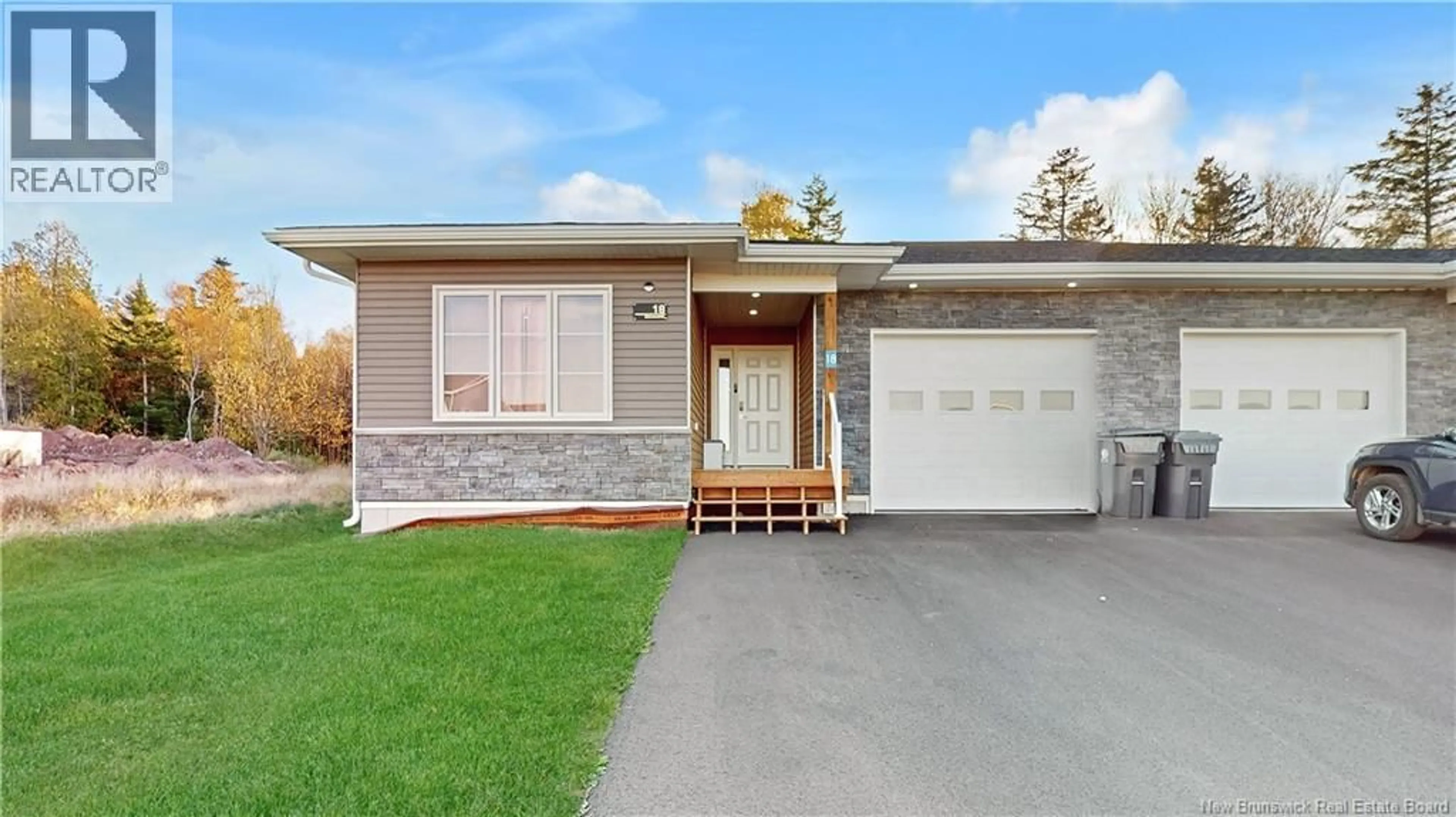 Home with vinyl exterior material, street for 18 ELMWOOD DRIVE, Hampton New Brunswick E5N0P9