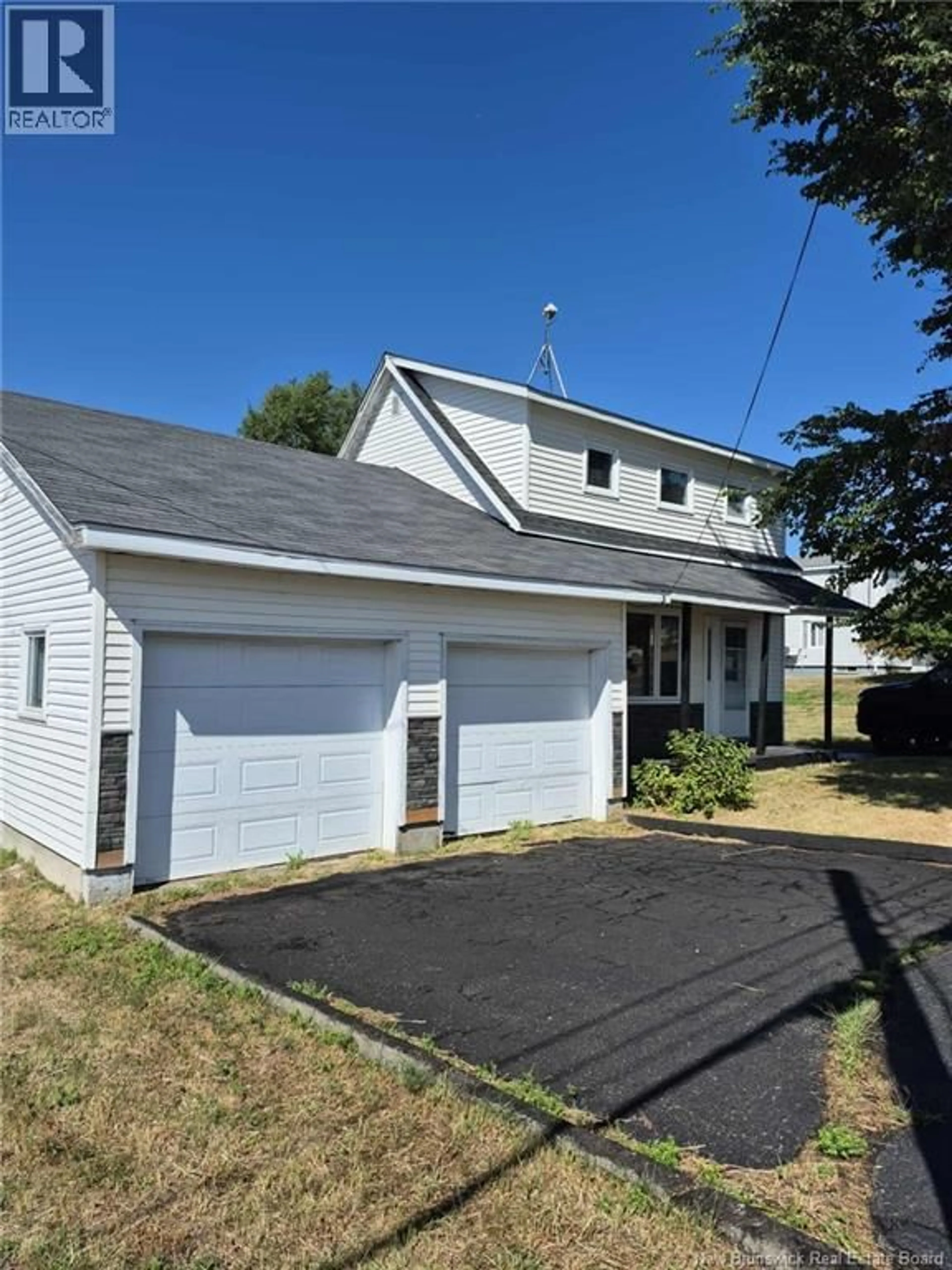 Home with vinyl exterior material, street for 7629 ST PAUL, Bas-Caraquet New Brunswick E1W6B9