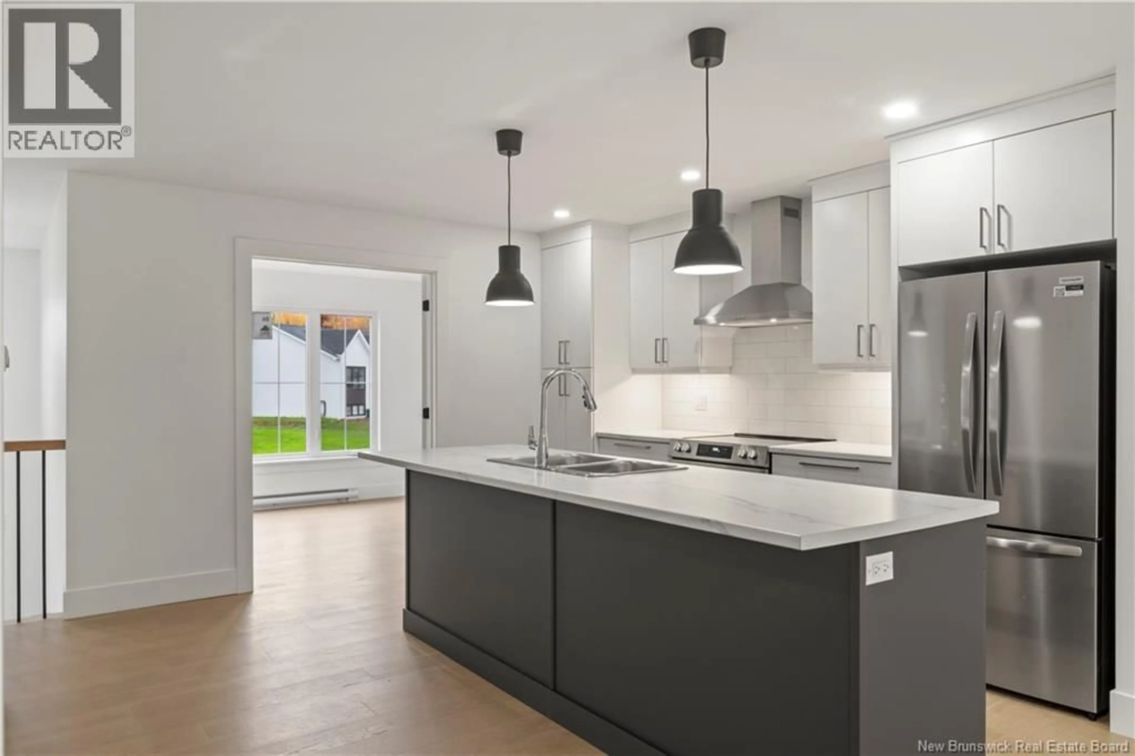 Open concept kitchen, ceramic/tile floor for 86 BEAU DOMAINE STREET, Dieppe New Brunswick E1A9H5