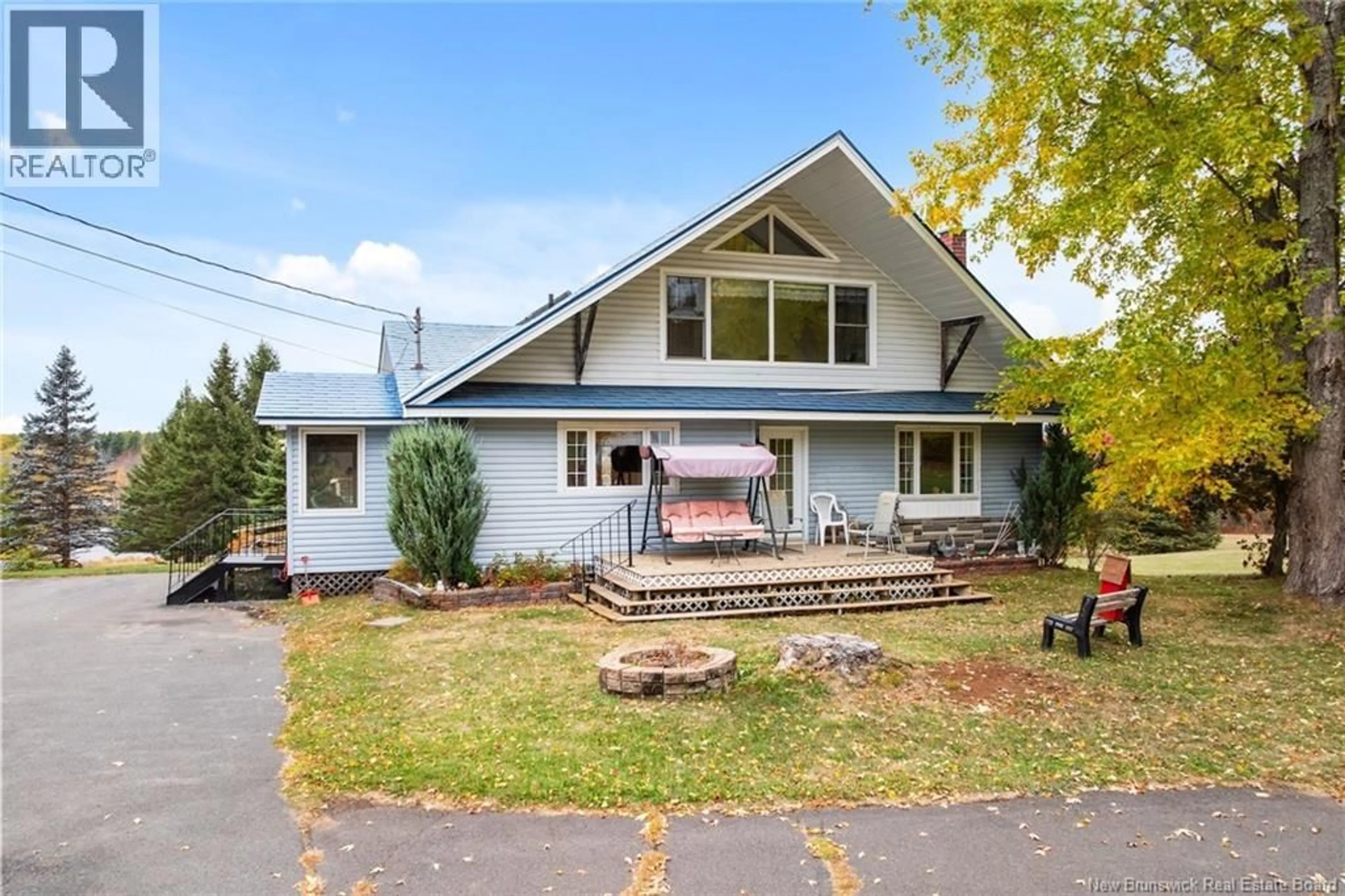 Home with vinyl exterior material, street for 560 MAIN STREET, Chipman New Brunswick E4A2P3