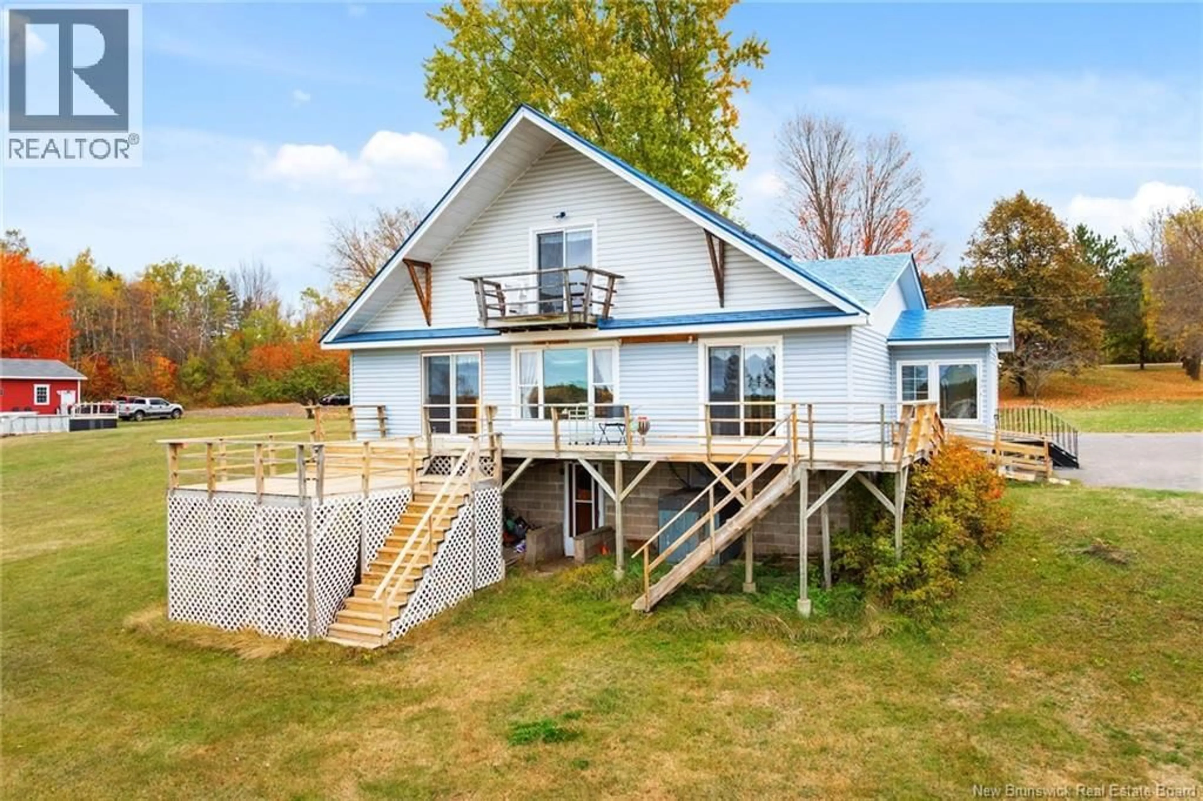 A pic from outside/outdoor area/front of a property/back of a property/a pic from drone, water/lake/river/ocean view for 560 MAIN STREET, Chipman New Brunswick E4A2P3