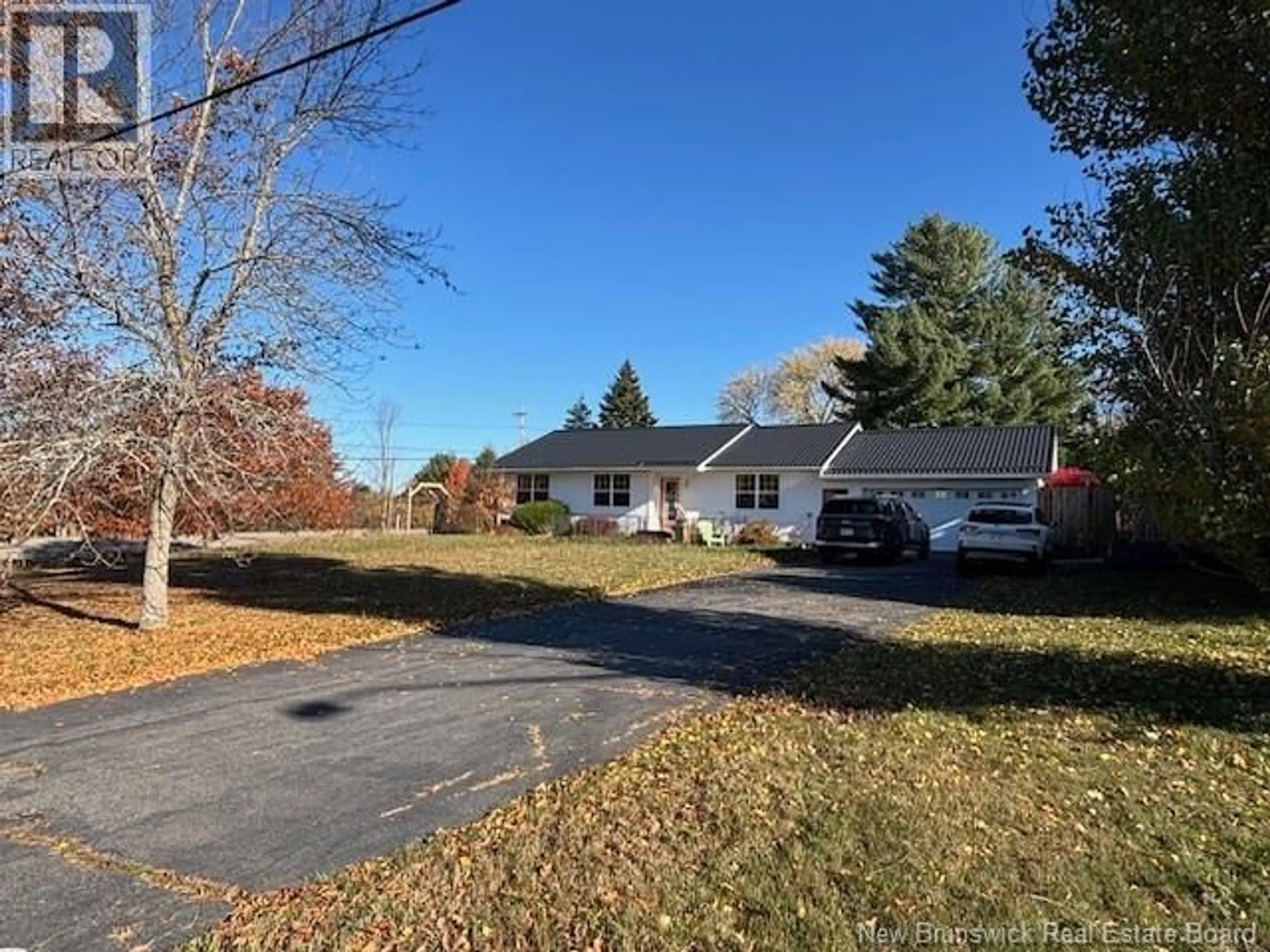 A pic from outside/outdoor area/front of a property/back of a property/a pic from drone, street for 2 MEREDITH DRIVE, Sussex Corner New Brunswick E4E2T7