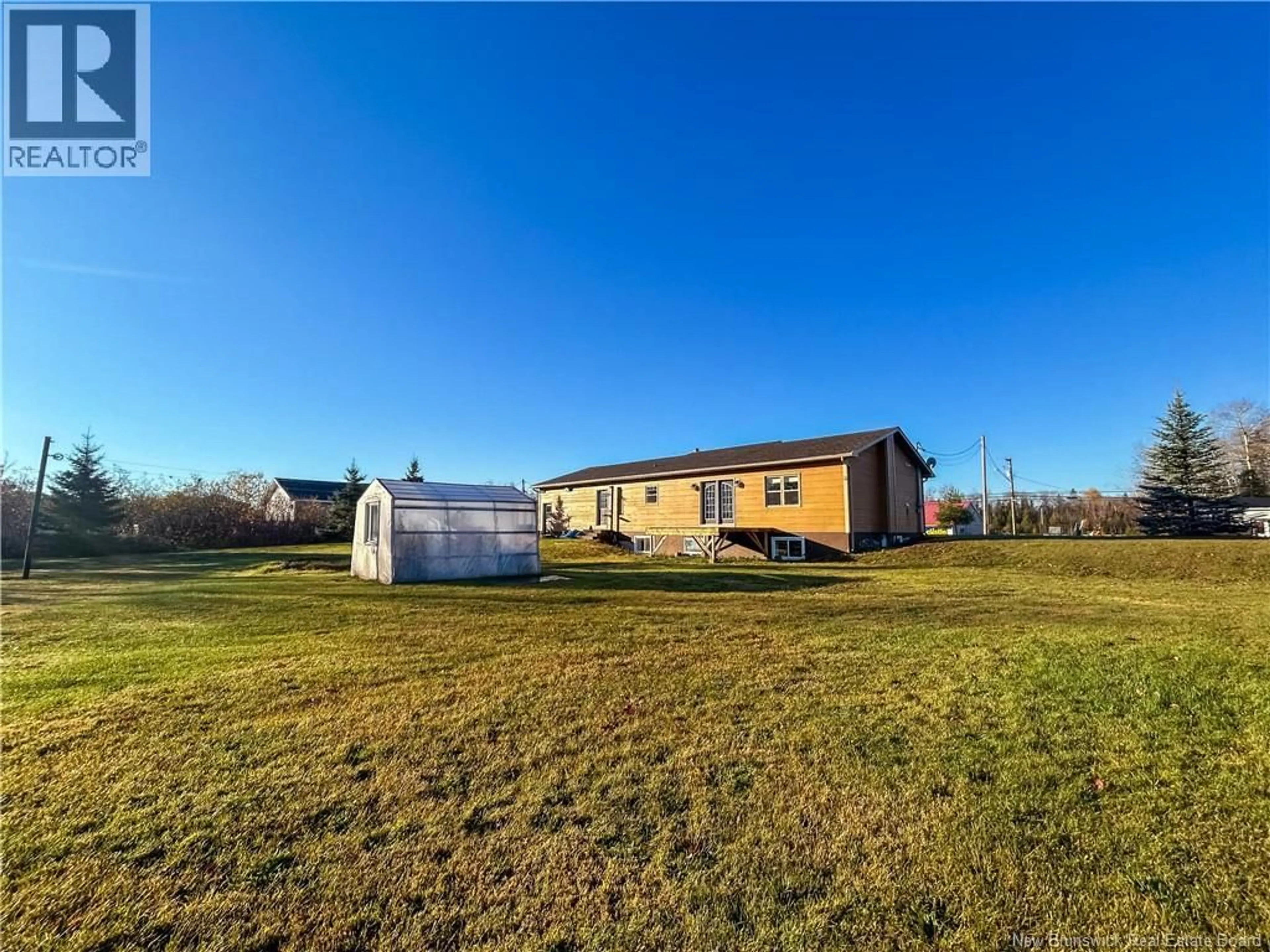 A pic from outside/outdoor area/front of a property/back of a property/a pic from drone, building for 627 PRINCIPALE RUE, Eel River Crossing New Brunswick E8E1S7