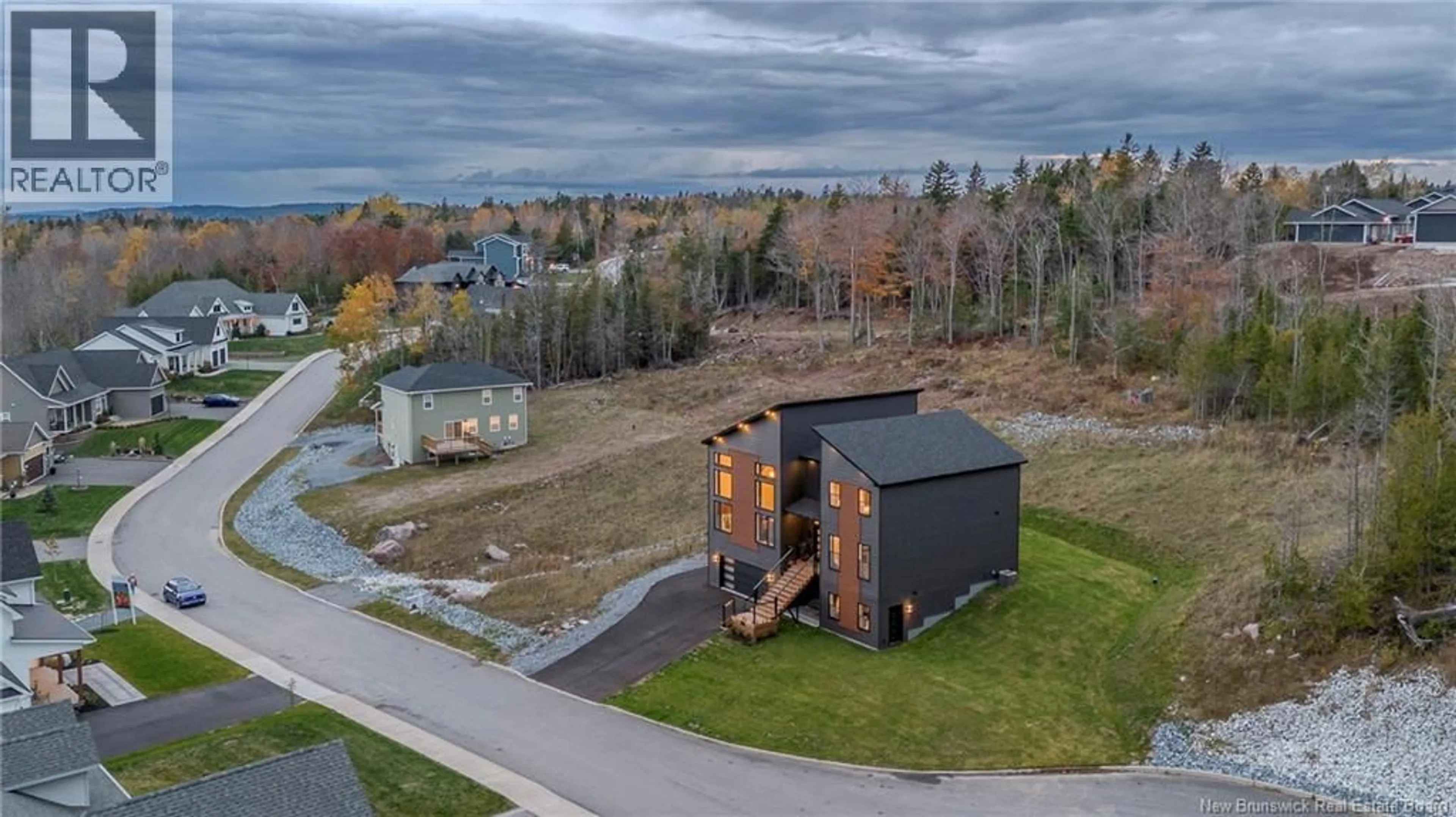 A pic from outside/outdoor area/front of a property/back of a property/a pic from drone, unknown for 31 HERITAGE WAY, Quispamsis New Brunswick E2E0T4