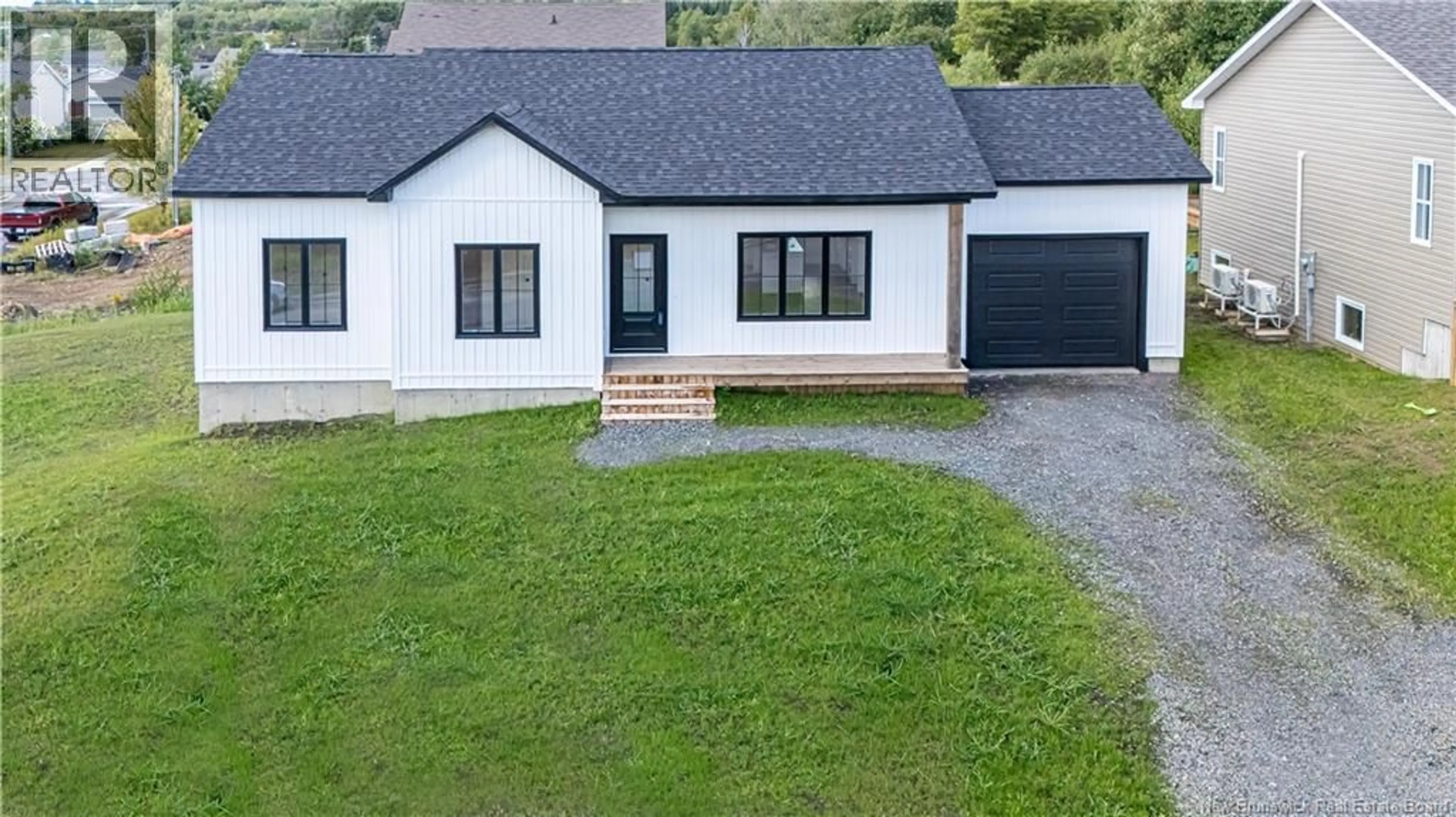 A pic from outside/outdoor area/front of a property/back of a property/a pic from drone, street for 201 GILRIDGE DRIVE, Fredericton New Brunswick E3G9W7