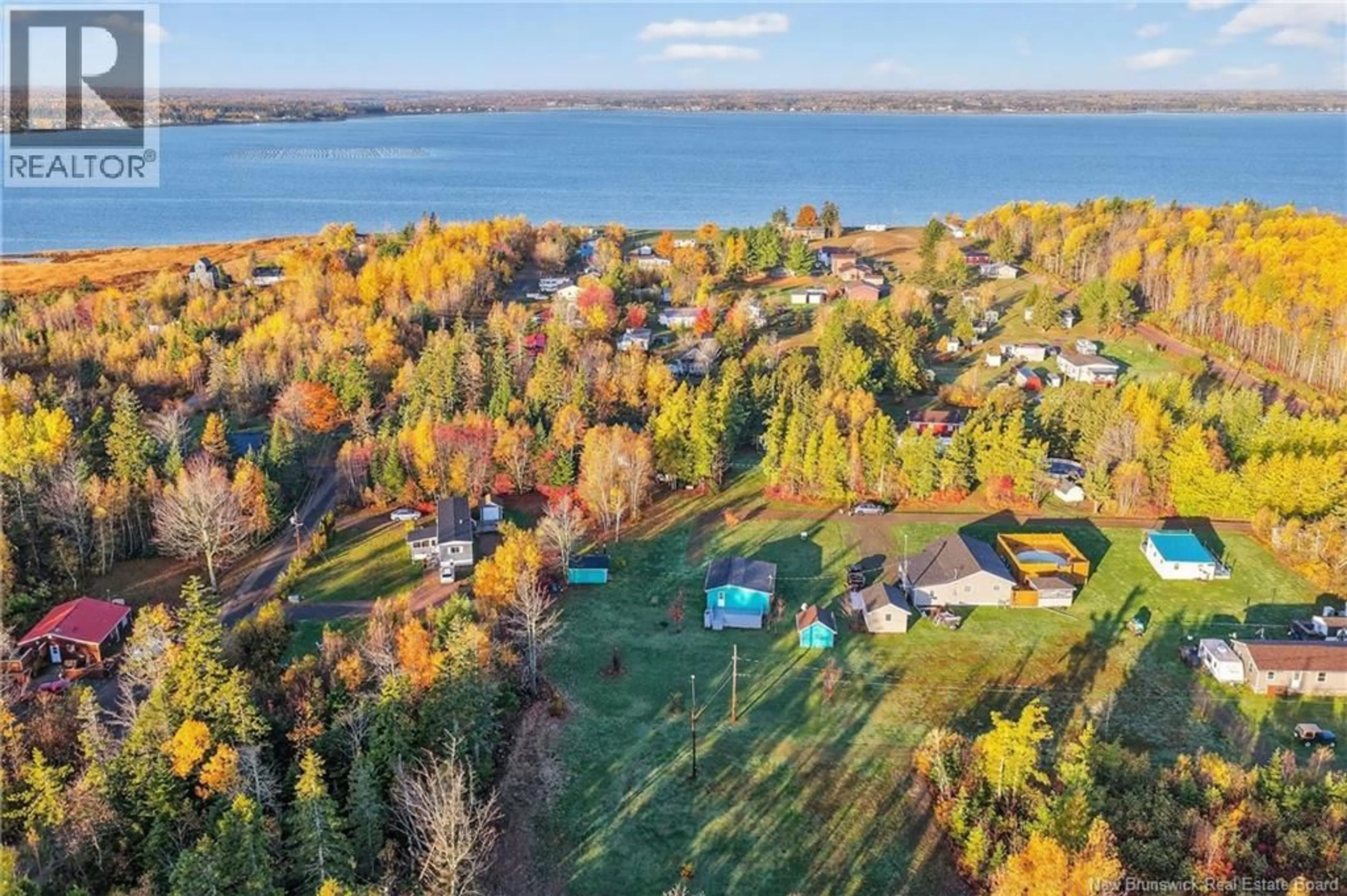 A pic from outside/outdoor area/front of a property/back of a property/a pic from drone, water/lake/river/ocean view for 17 STEPHANE, Grande-Digue New Brunswick E4R5T2