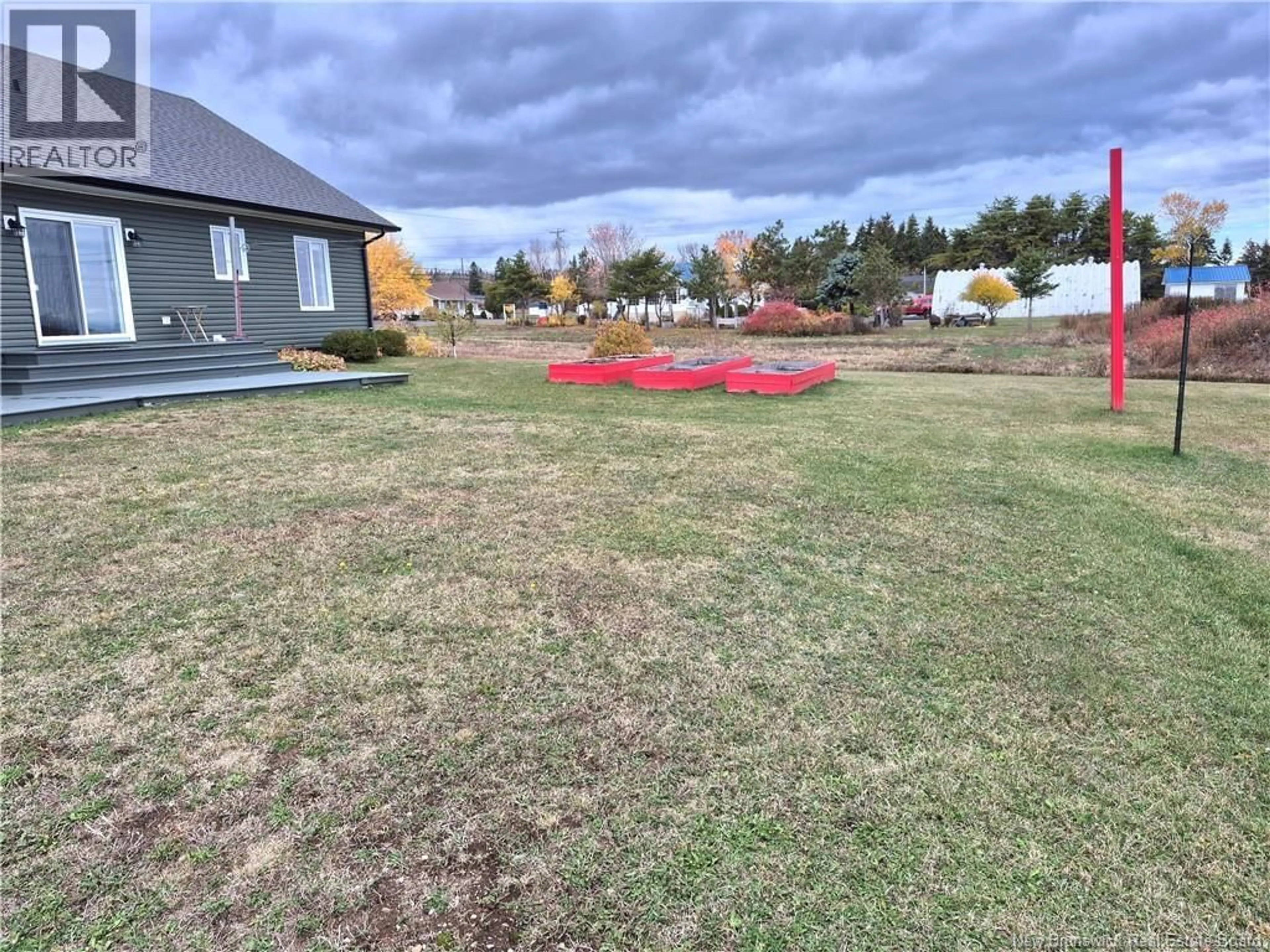 A pic from outside/outdoor area/front of a property/back of a property/a pic from drone, mountain view for 615 RUE PRINCIPALE, Pointe-Verte New Brunswick E8J2P7
