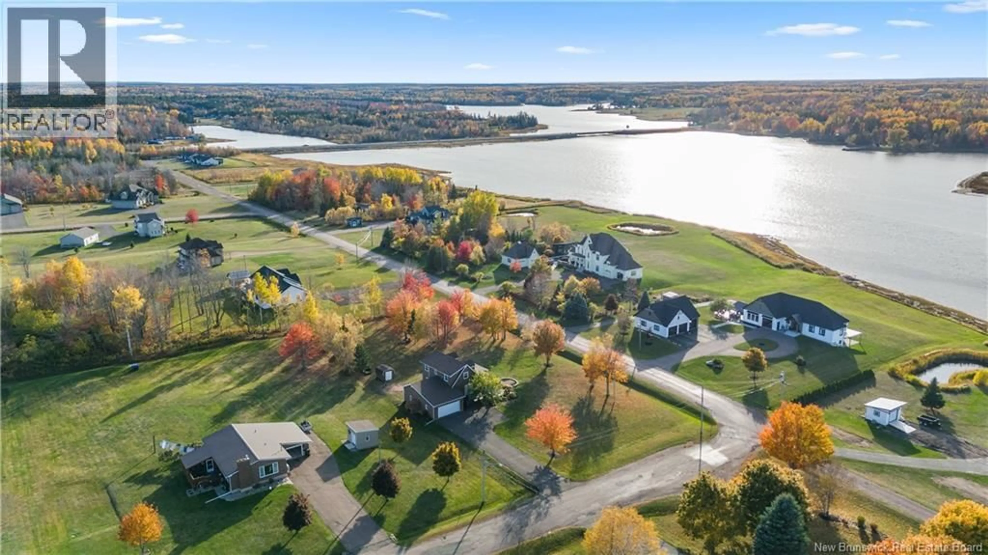 A pic from outside/outdoor area/front of a property/back of a property/a pic from drone, water/lake/river/ocean view for 8 SUNSET STREET, Grand-Barachois New Brunswick E4P8N8