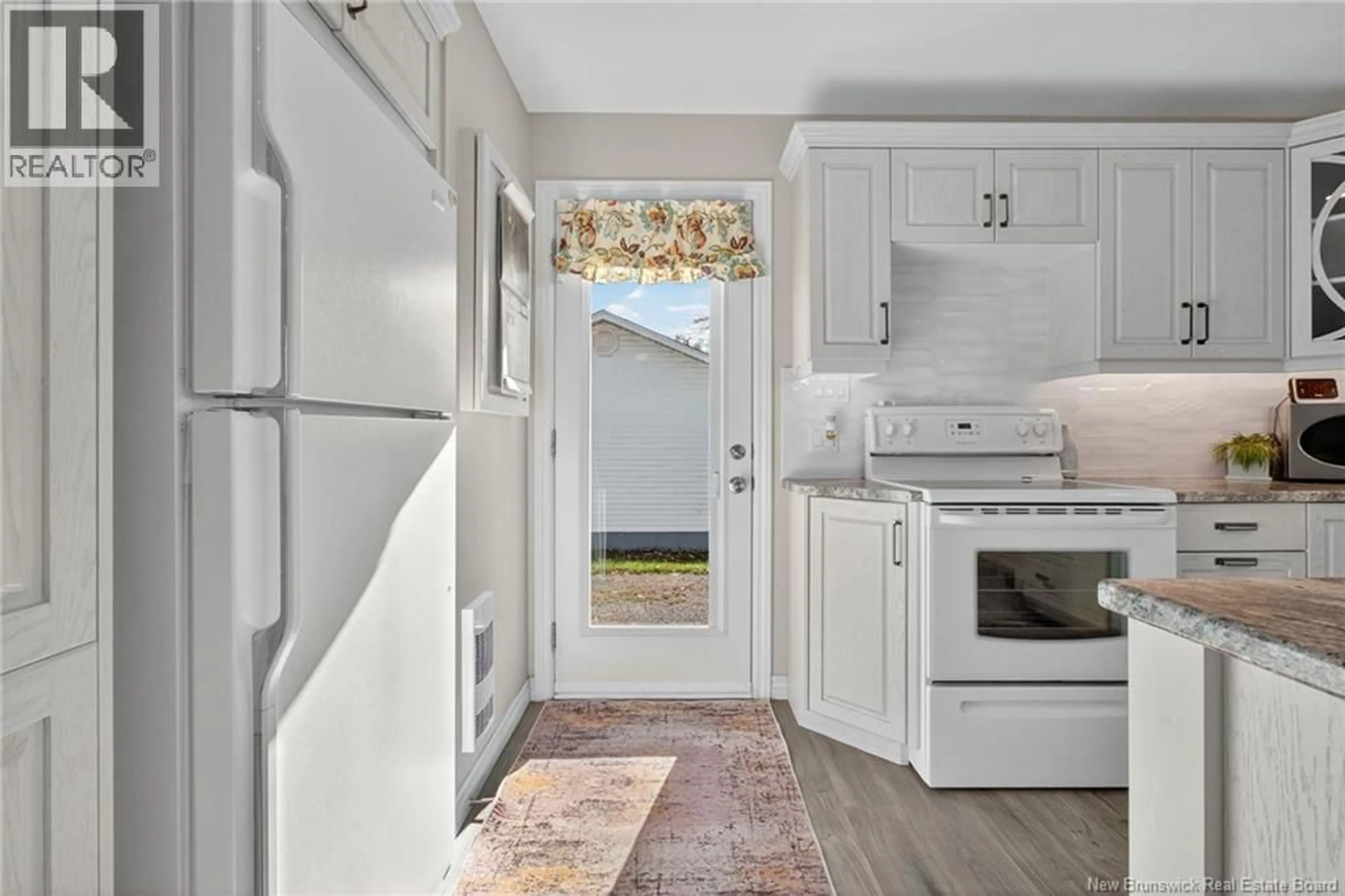 Open concept kitchen, ceramic/tile floor for 26 REEDER ROAD, Salisbury New Brunswick E4J2P5