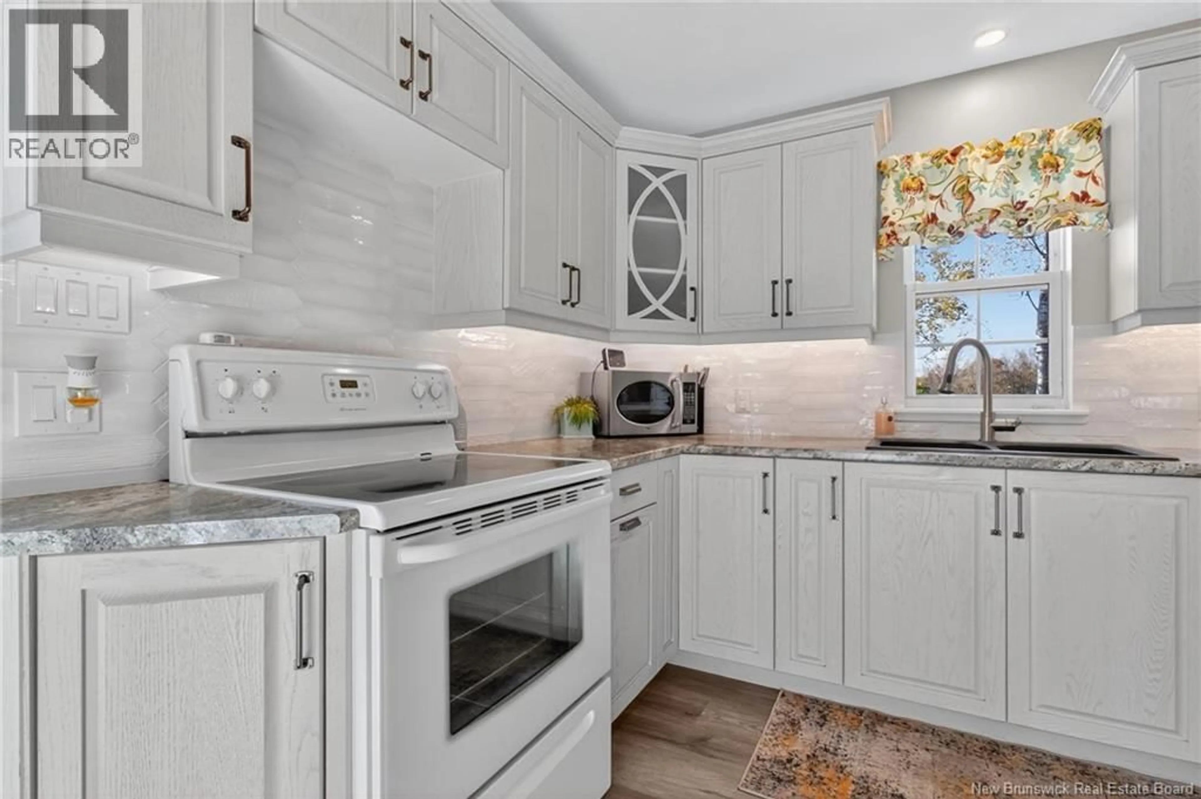 Open concept kitchen, ceramic/tile floor for 26 REEDER ROAD, Salisbury New Brunswick E4J2P5