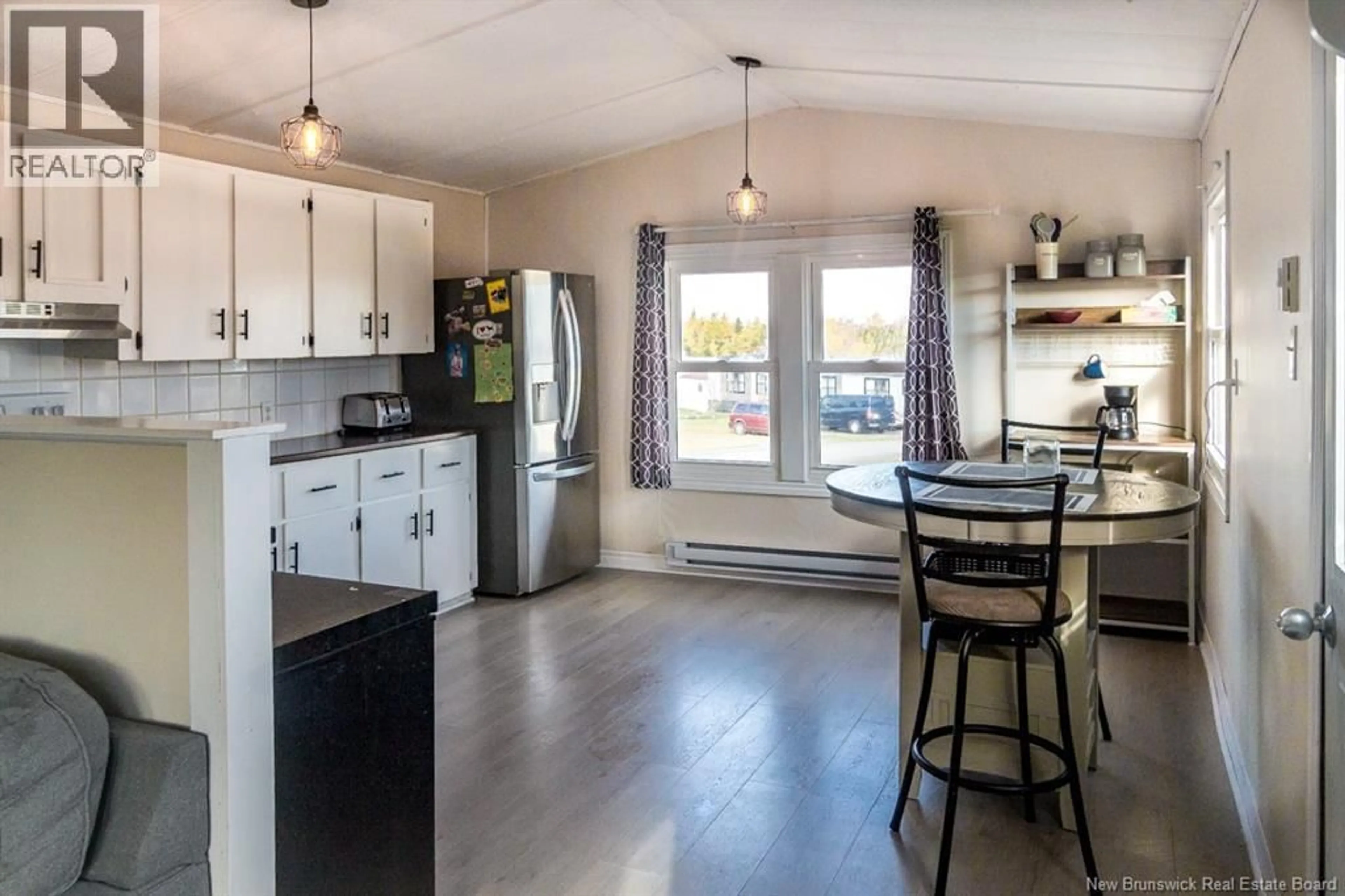 Open concept kitchen, wood/laminate floor for 10 NOUWENS DRIVE, Saint John New Brunswick E2M1P1