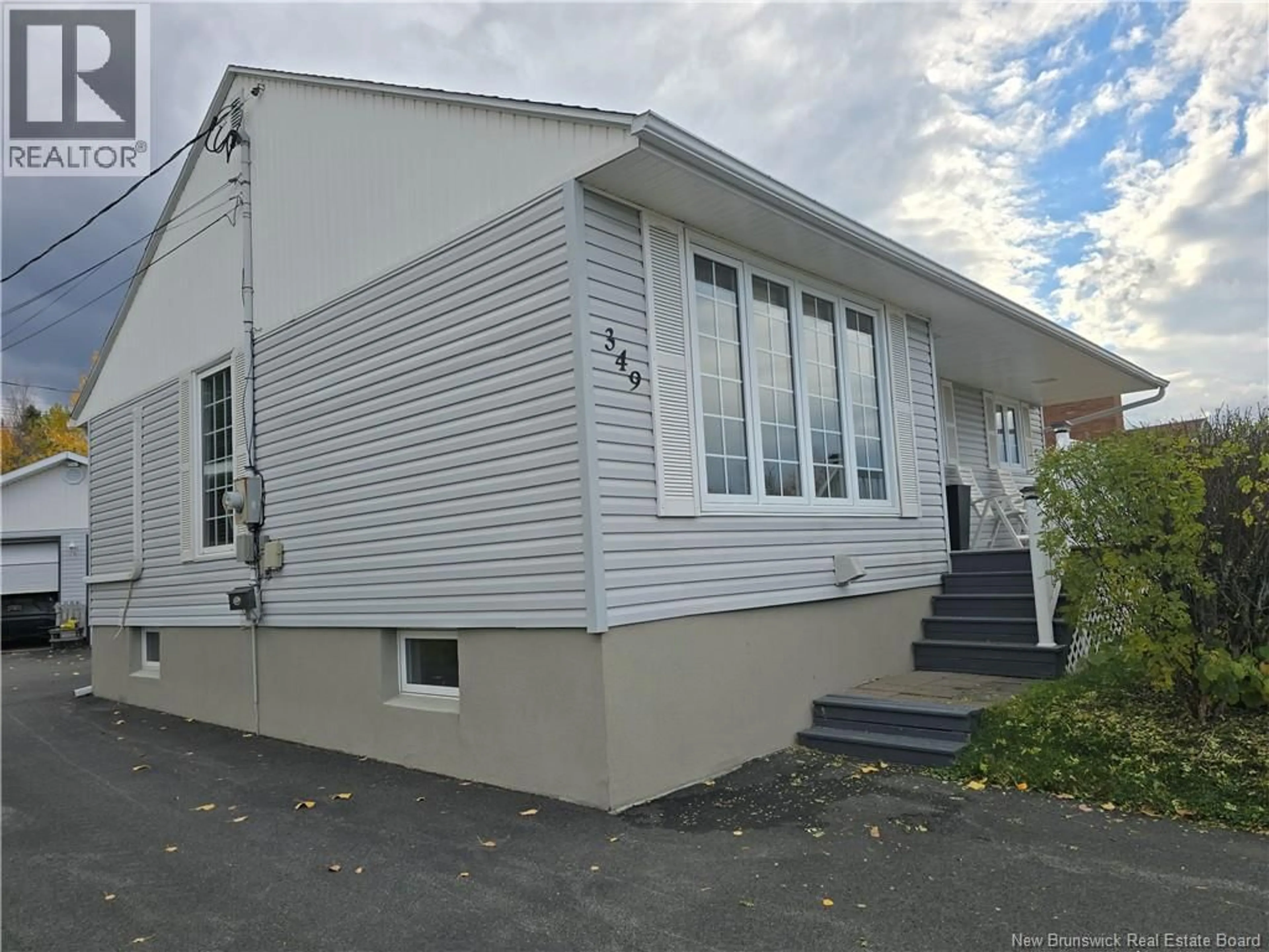 Home with vinyl exterior material, street for 349 HENNESSY, Bathurst New Brunswick E2A2N8