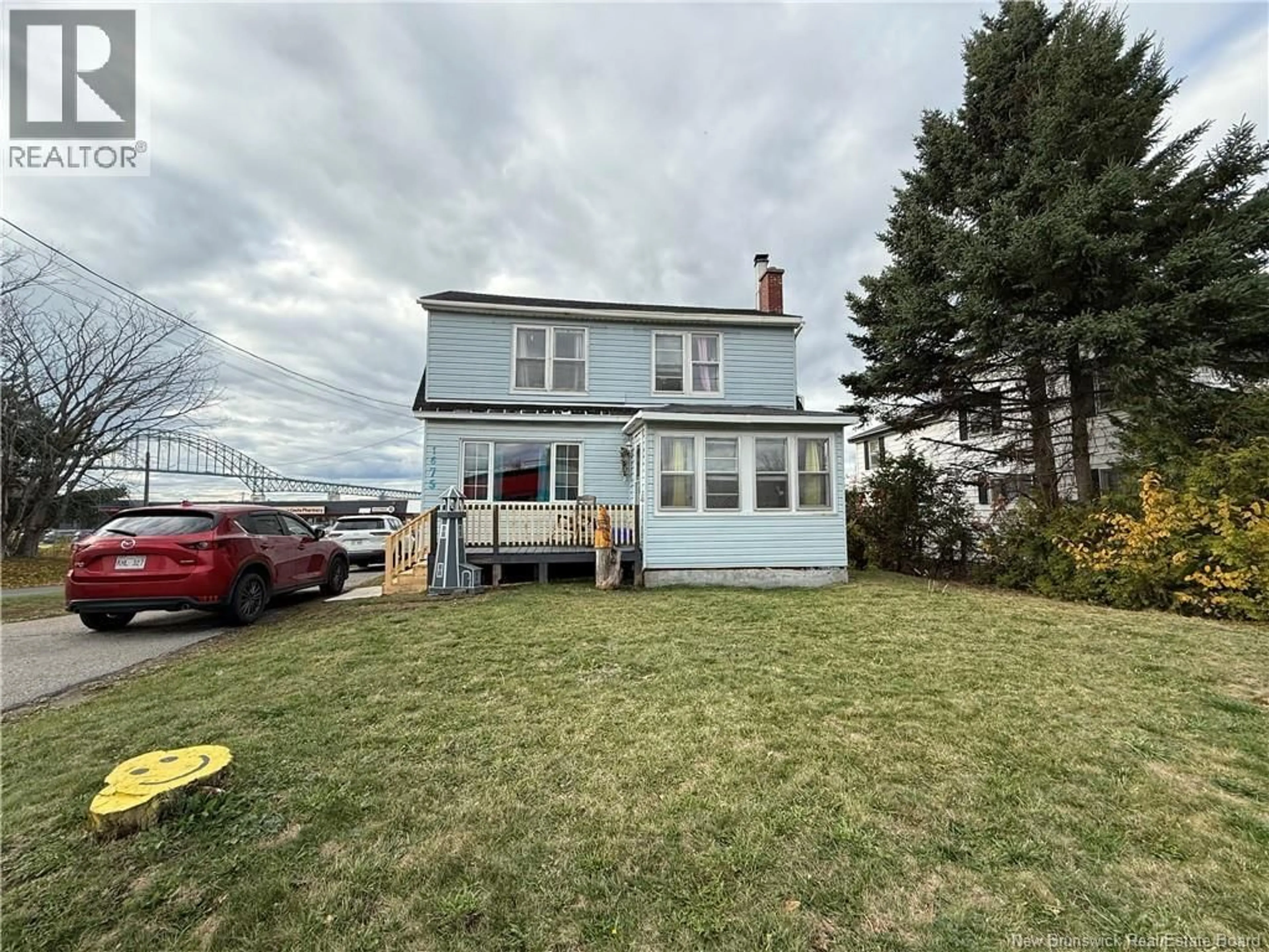 A pic from outside/outdoor area/front of a property/back of a property/a pic from drone, street for 1675 WATER STREET, Miramichi New Brunswick E1N3X4