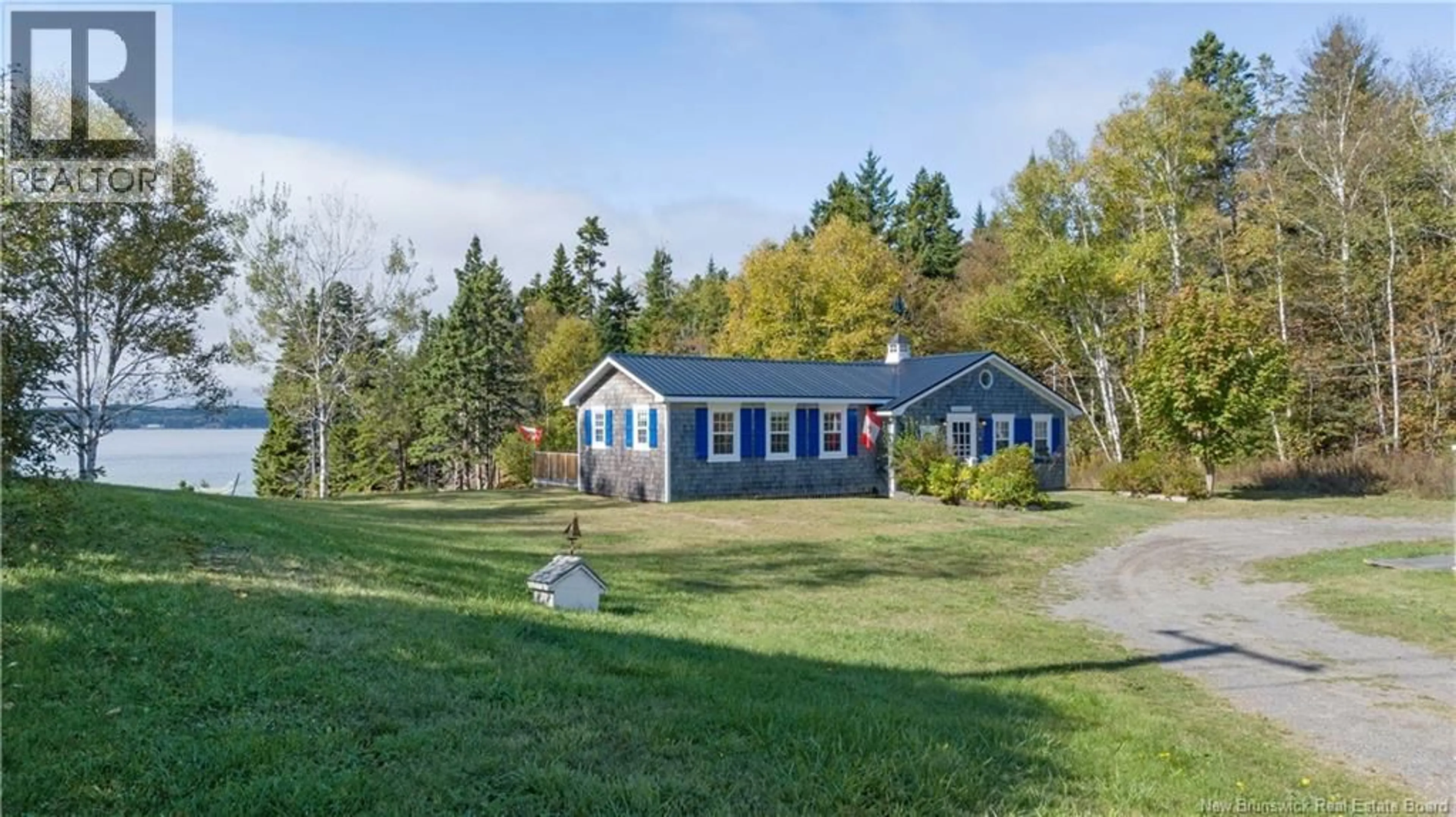 A pic from outside/outdoor area/front of a property/back of a property/a pic from drone, water/lake/river/ocean view for 29 LIGHTHOUSE ROAD, Campobello New Brunswick E5E1K6