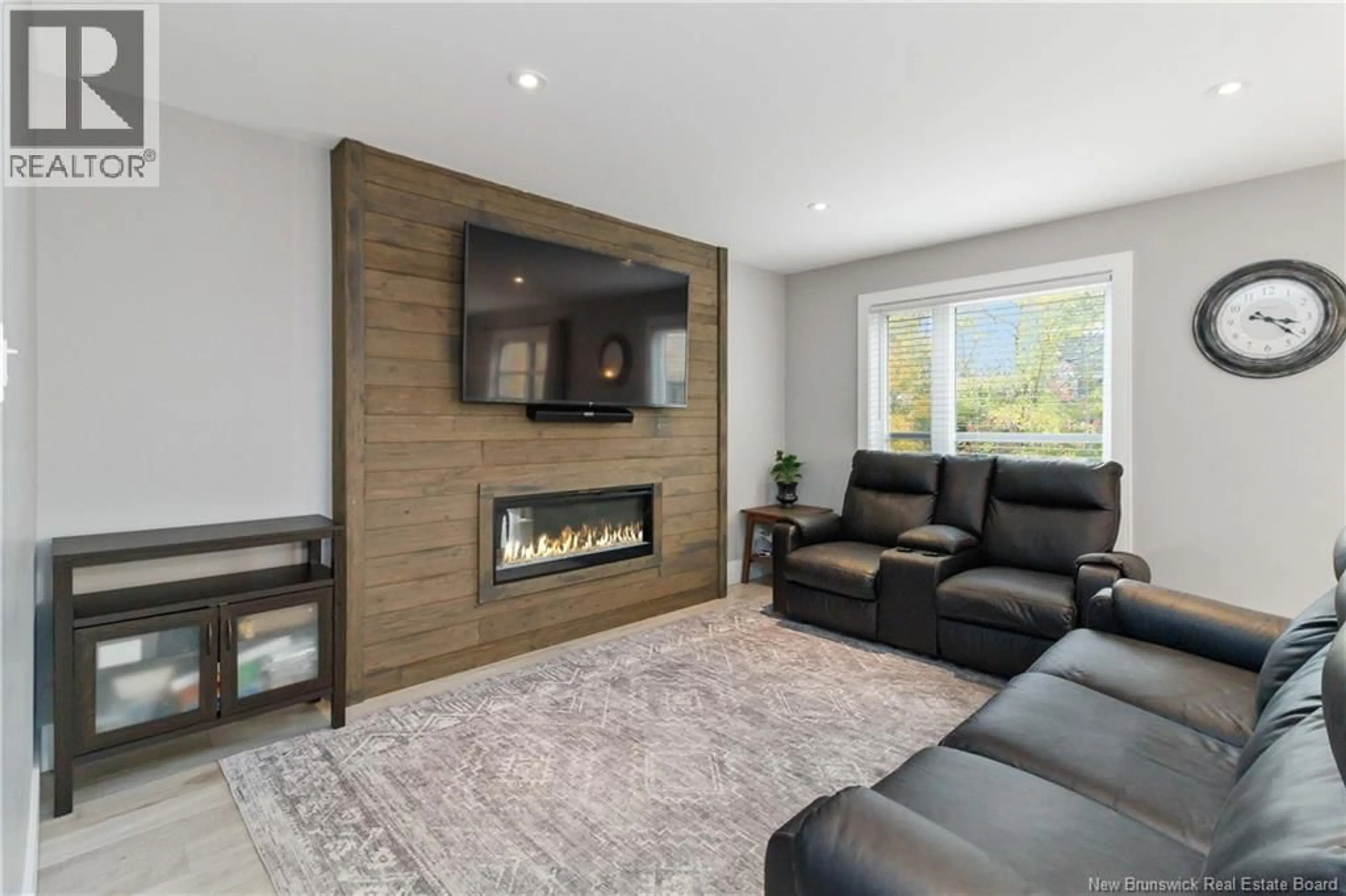 Living room with furniture, wood/laminate floor for 78 FRANCFORT CRESCENT, Moncton New Brunswick E1G5W6