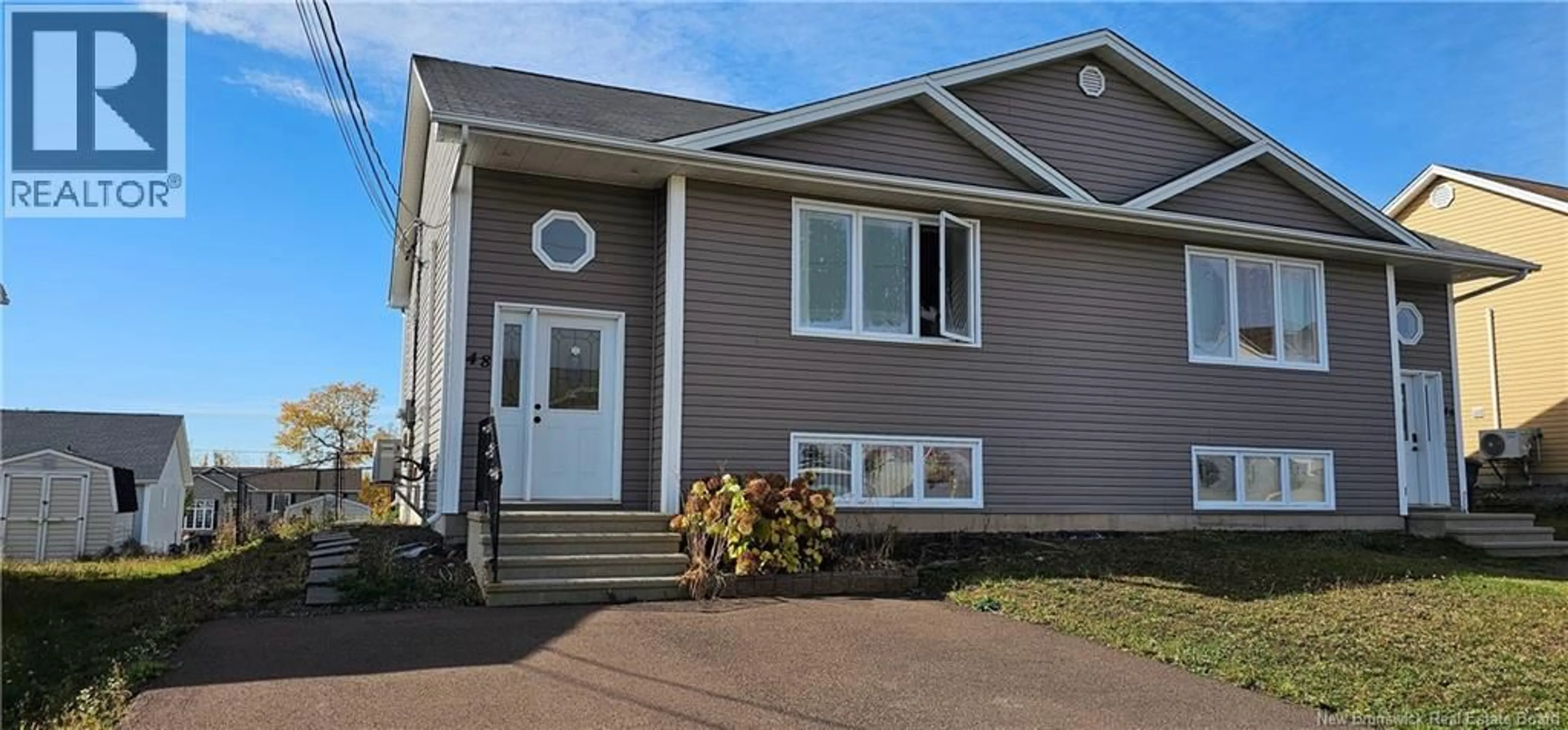 Home with vinyl exterior material, street for 48 TANYA CRESCENT, Moncton New Brunswick E1E4W5