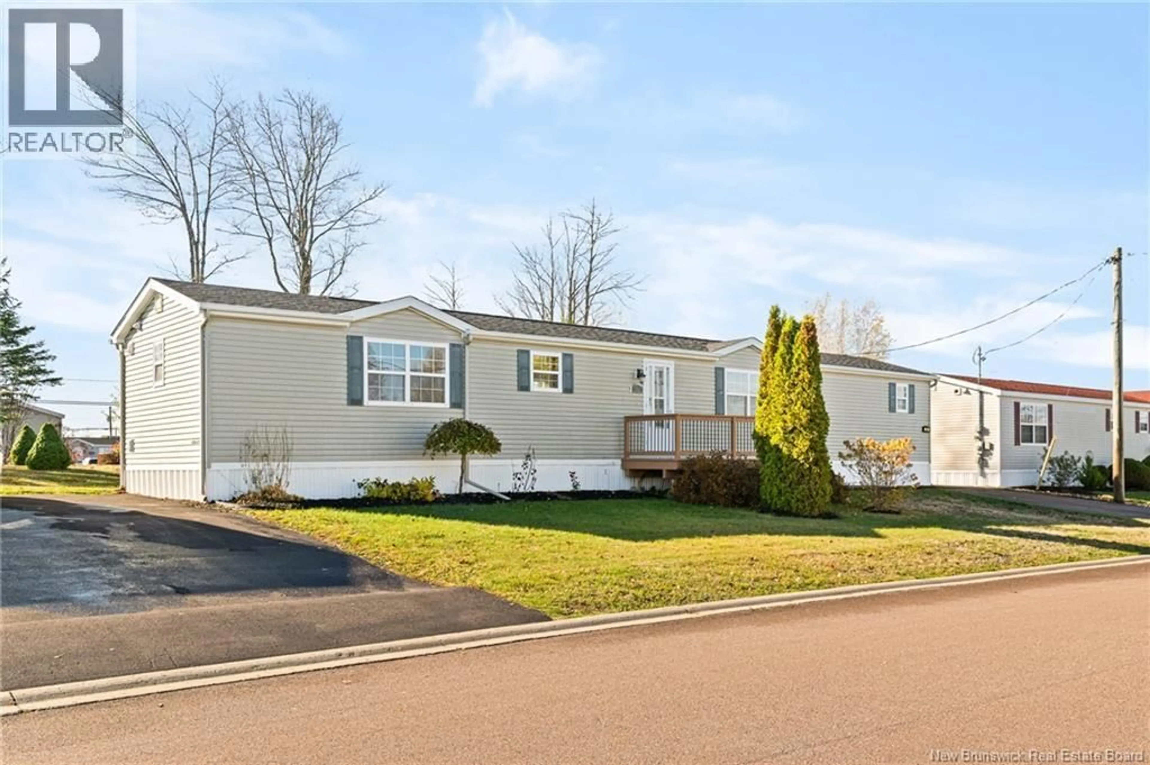 Home with vinyl exterior material, street for 23 RICHIBUCTOU LANE, Dieppe New Brunswick E1A7N1