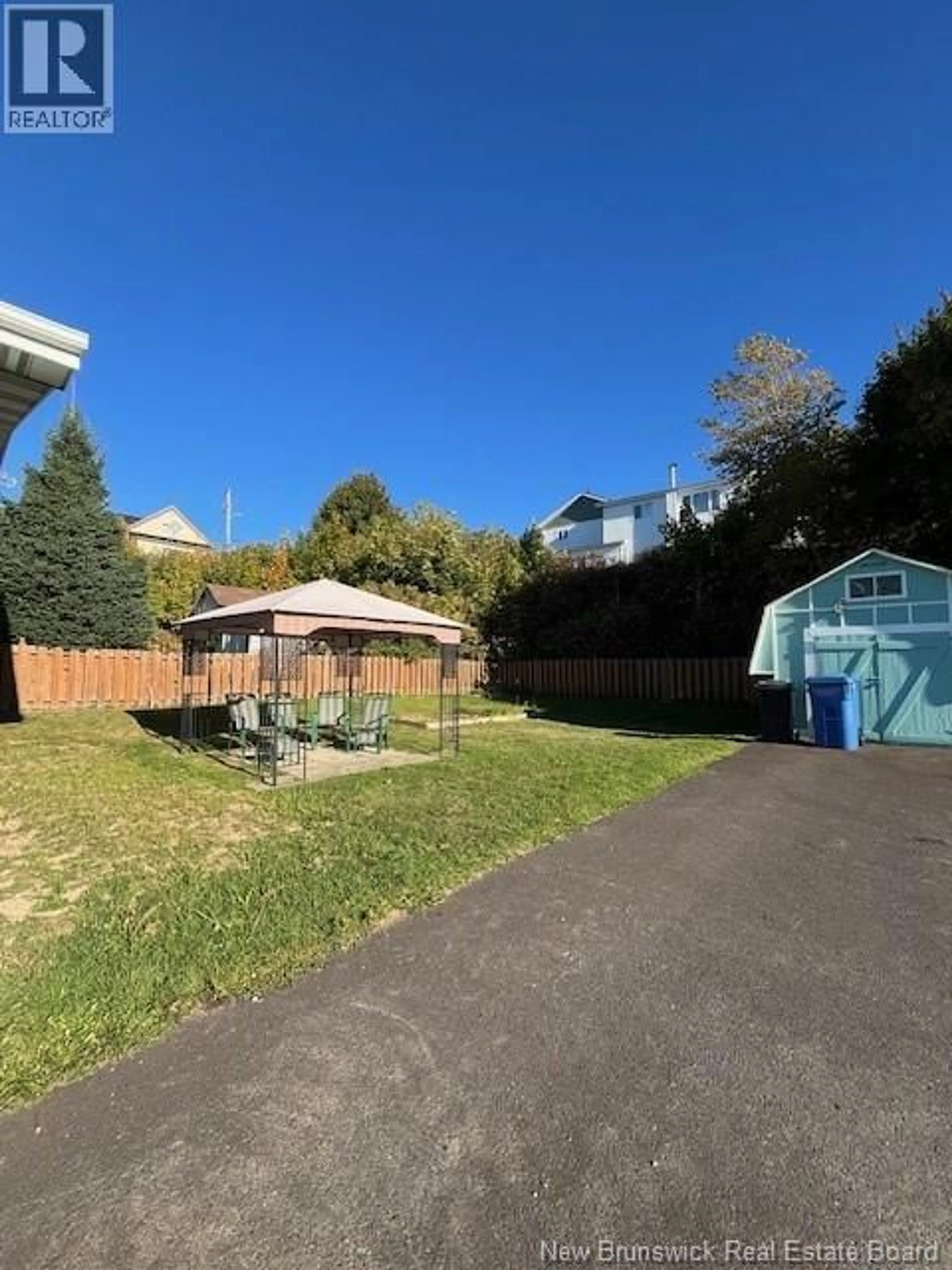 A pic from outside/outdoor area/front of a property/back of a property/a pic from drone, street for 196 FERGUSON STREET, Atholville New Brunswick E3N4P4