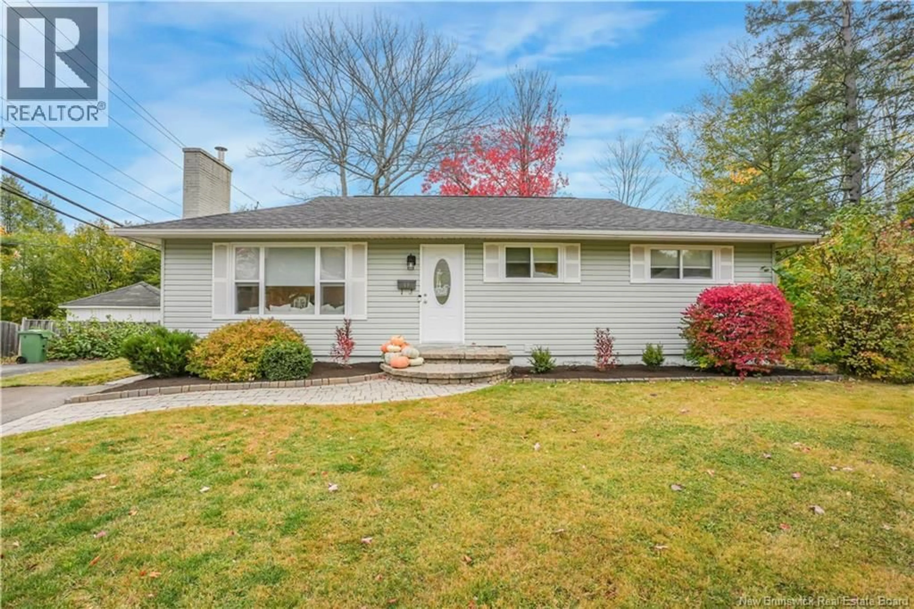 Home with vinyl exterior material, street for 69 MANCHESTER COURT, Fredericton New Brunswick E3B4P2