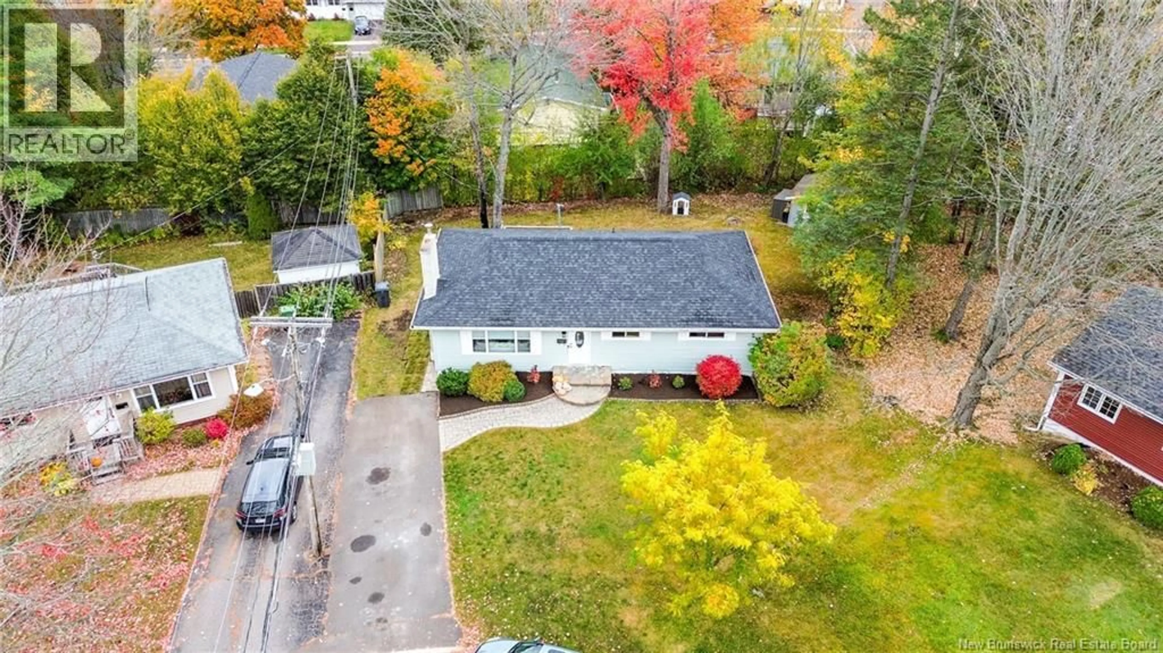 A pic from outside/outdoor area/front of a property/back of a property/a pic from drone, street for 69 MANCHESTER COURT, Fredericton New Brunswick E3B4P2