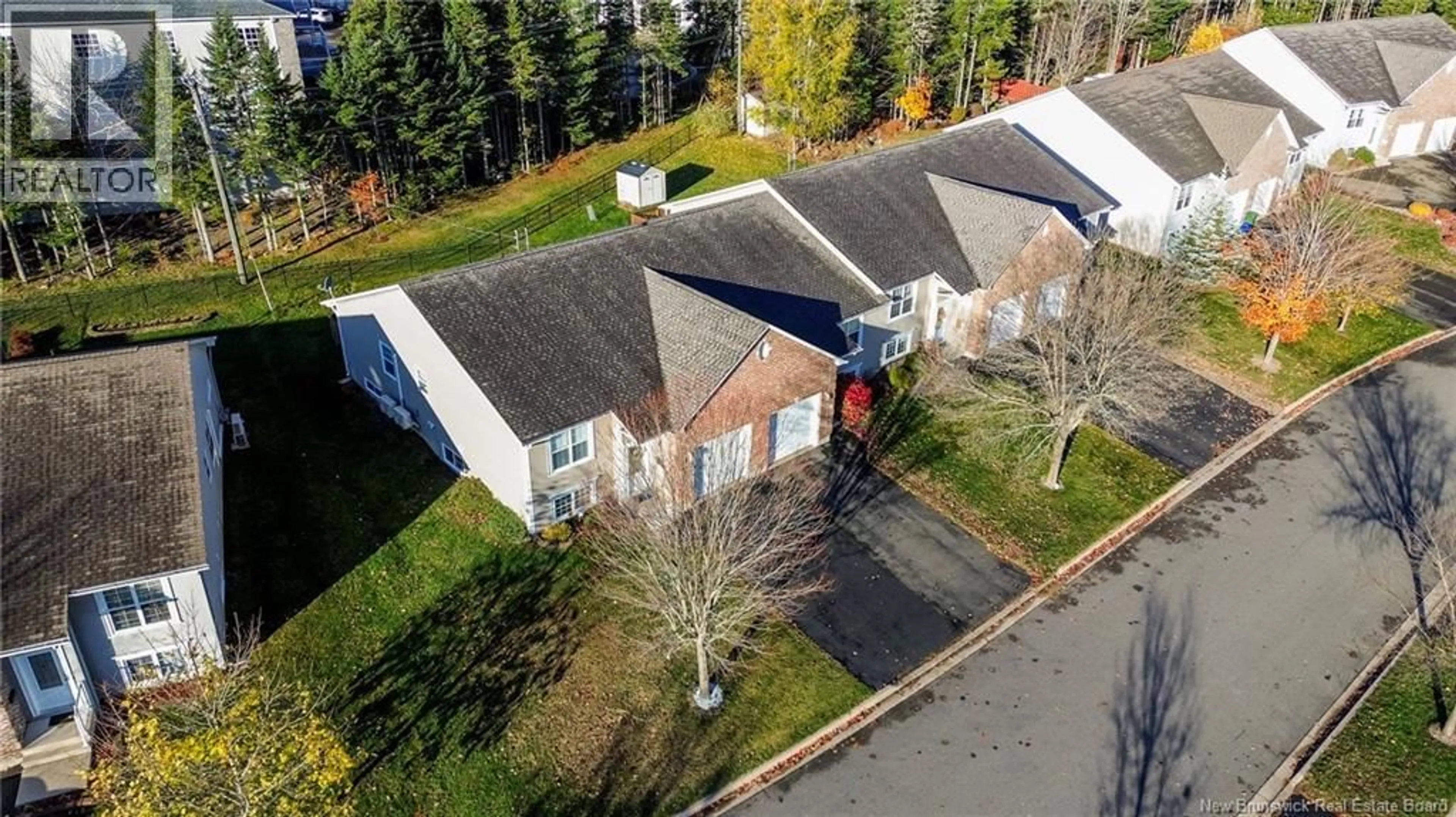 A pic from outside/outdoor area/front of a property/back of a property/a pic from drone, street for 78 MILLRIDGE LANE, Fredericton New Brunswick E3A0S7