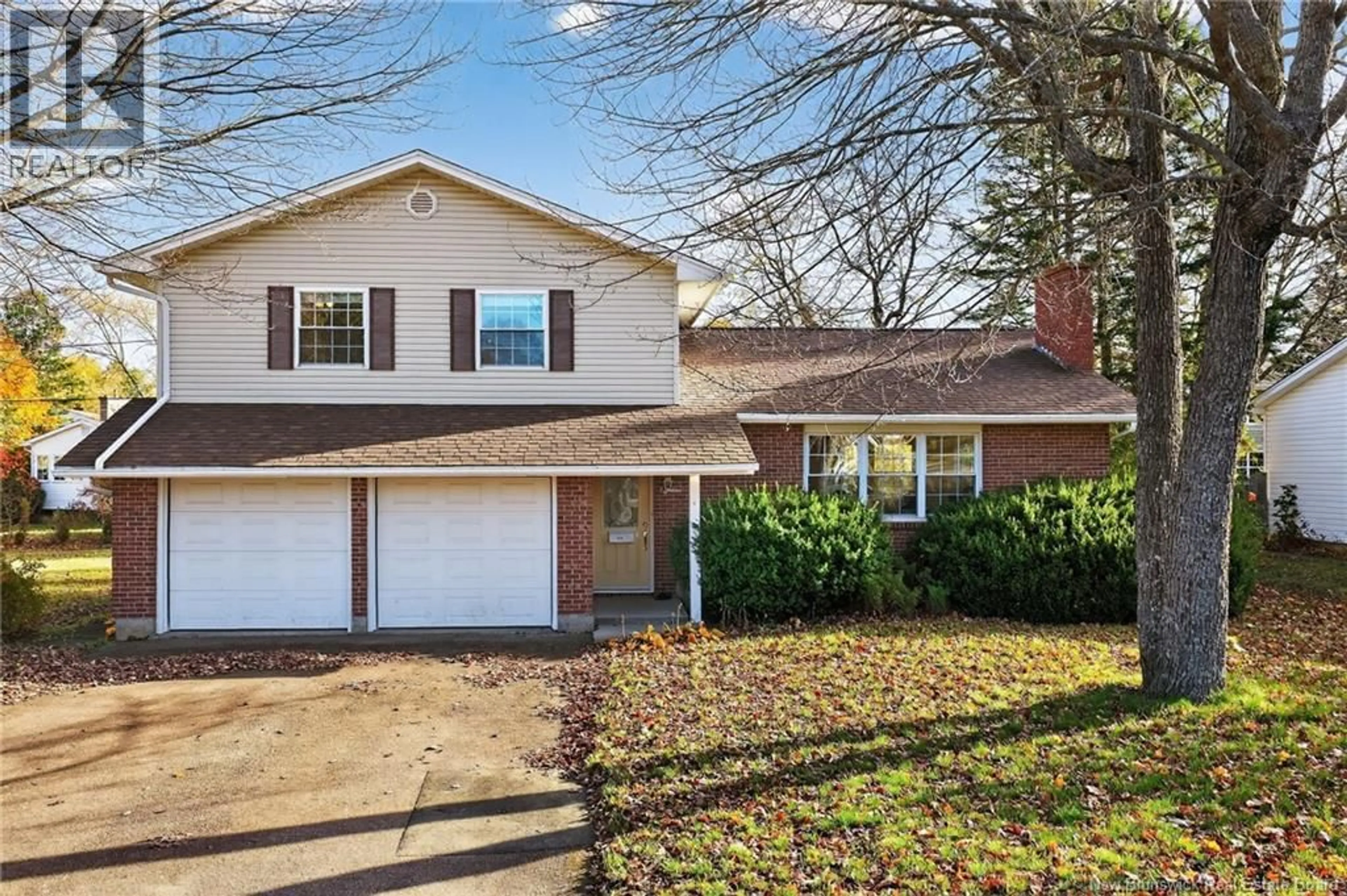 Home with vinyl exterior material, street for 18 GRINDSTONE DRIVE, Riverview New Brunswick E1B3N9