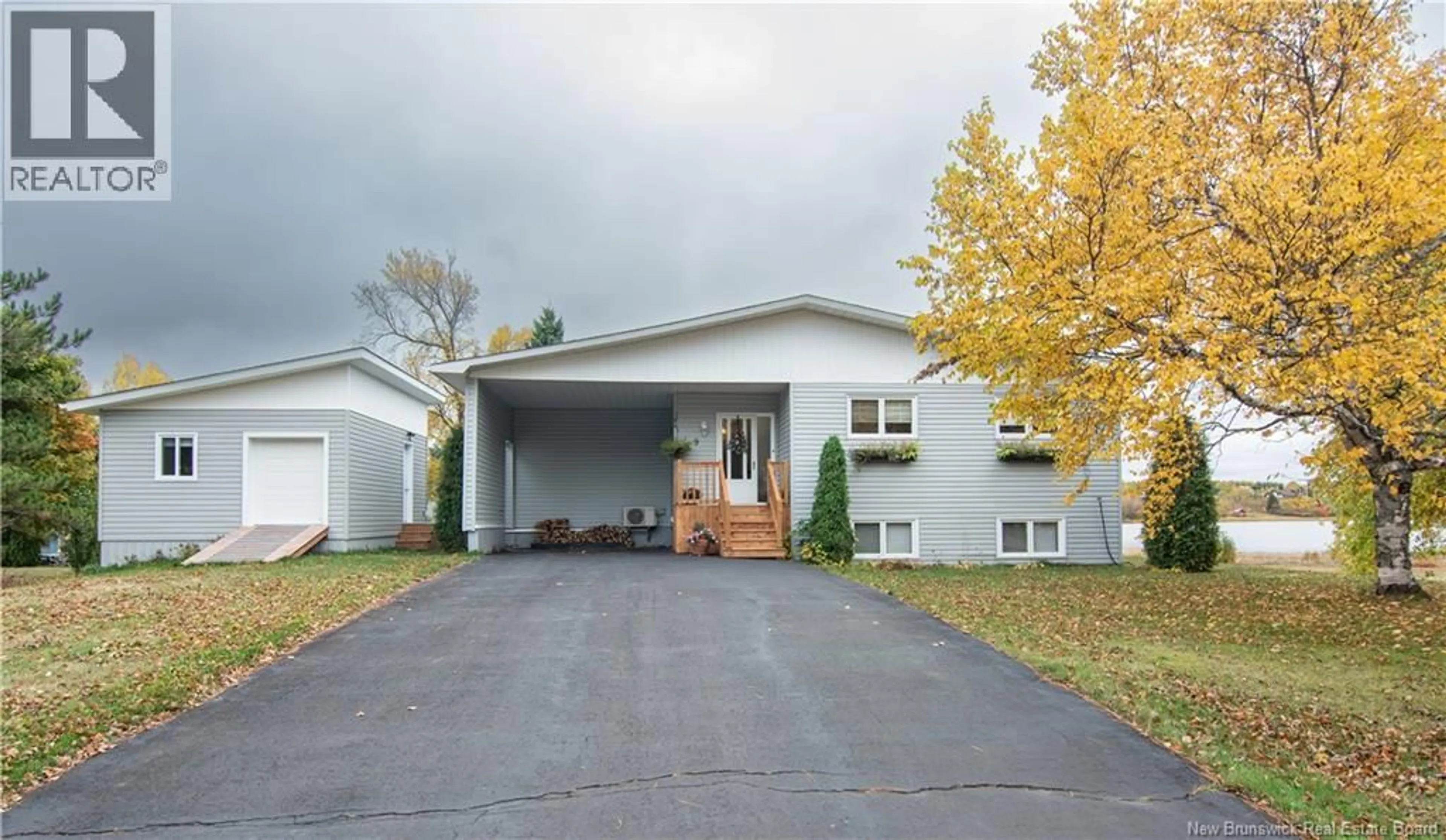 Home with vinyl exterior material, street for 9 ARCHIGNY, Saint-Louis-De-Kent New Brunswick E4X1C5