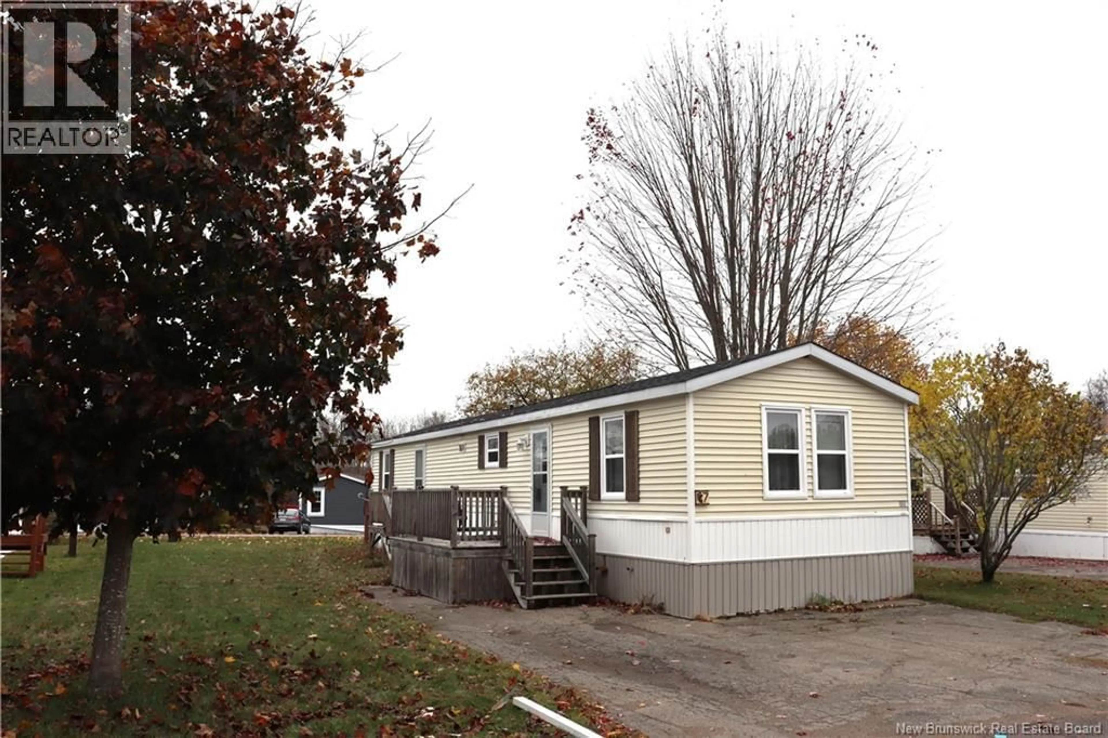 Home with vinyl exterior material, street for 7 BROOKVIEW STREET, Sussex Corner New Brunswick E4E2W3