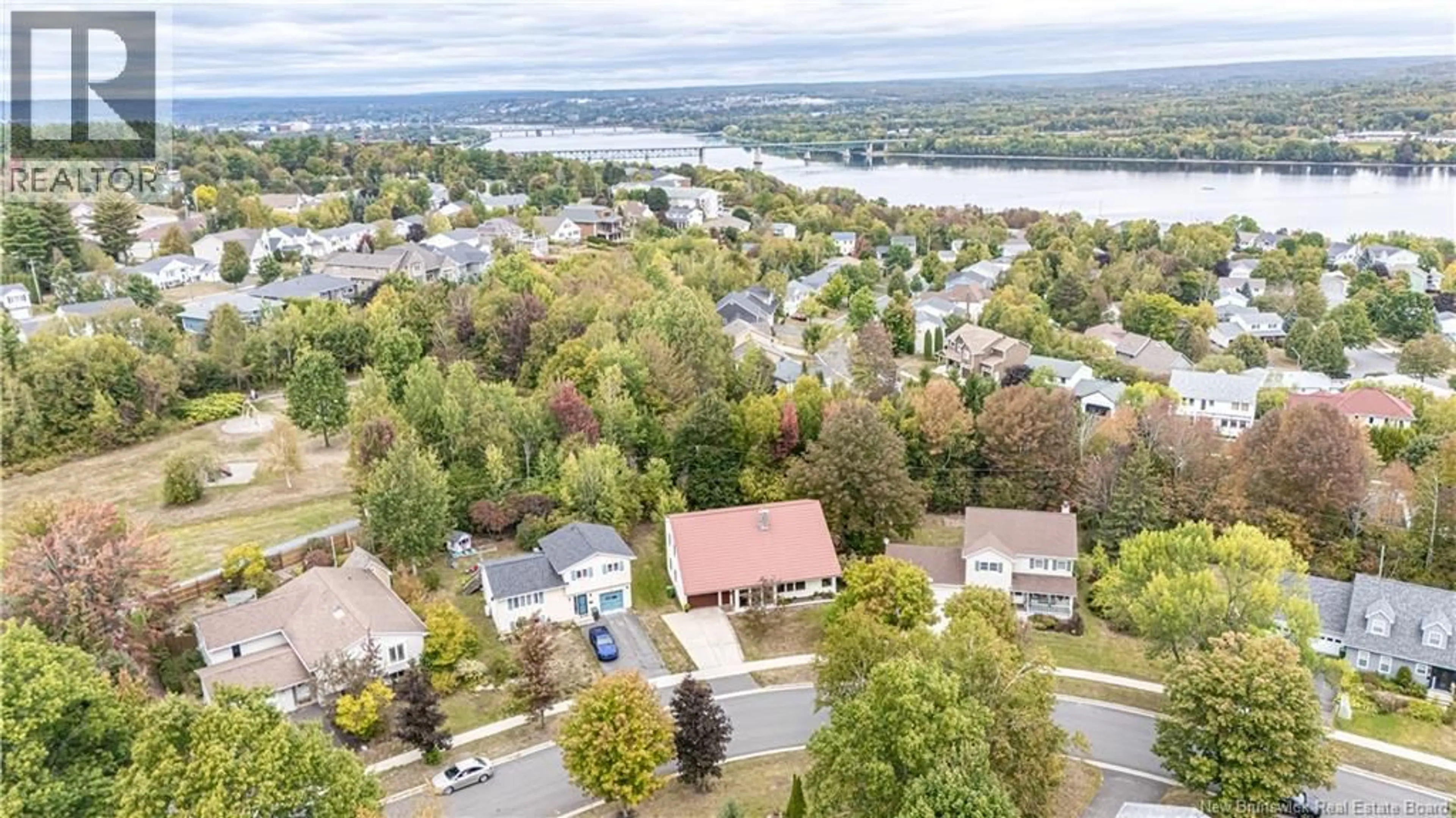 A pic from outside/outdoor area/front of a property/back of a property/a pic from drone, water/lake/river/ocean view for 69 PUGSLEY STREET, Fredericton New Brunswick E3B6J2