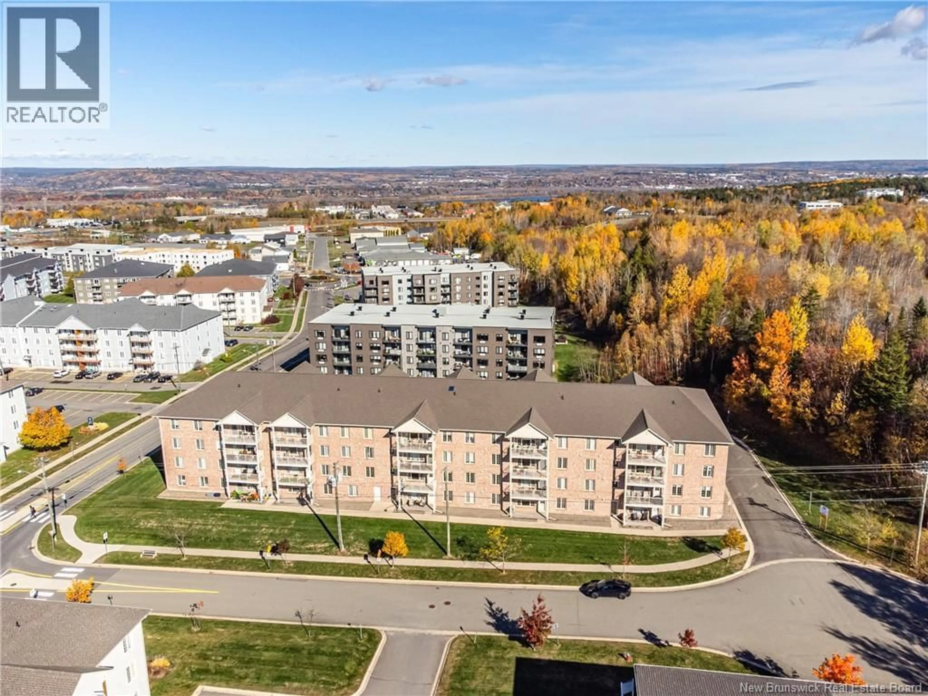 A pic from outside/outdoor area/front of a property/back of a property/a pic from drone, unknown for 328 - 165 VALCOUR DRIVE, Fredericton New Brunswick E3C0H5