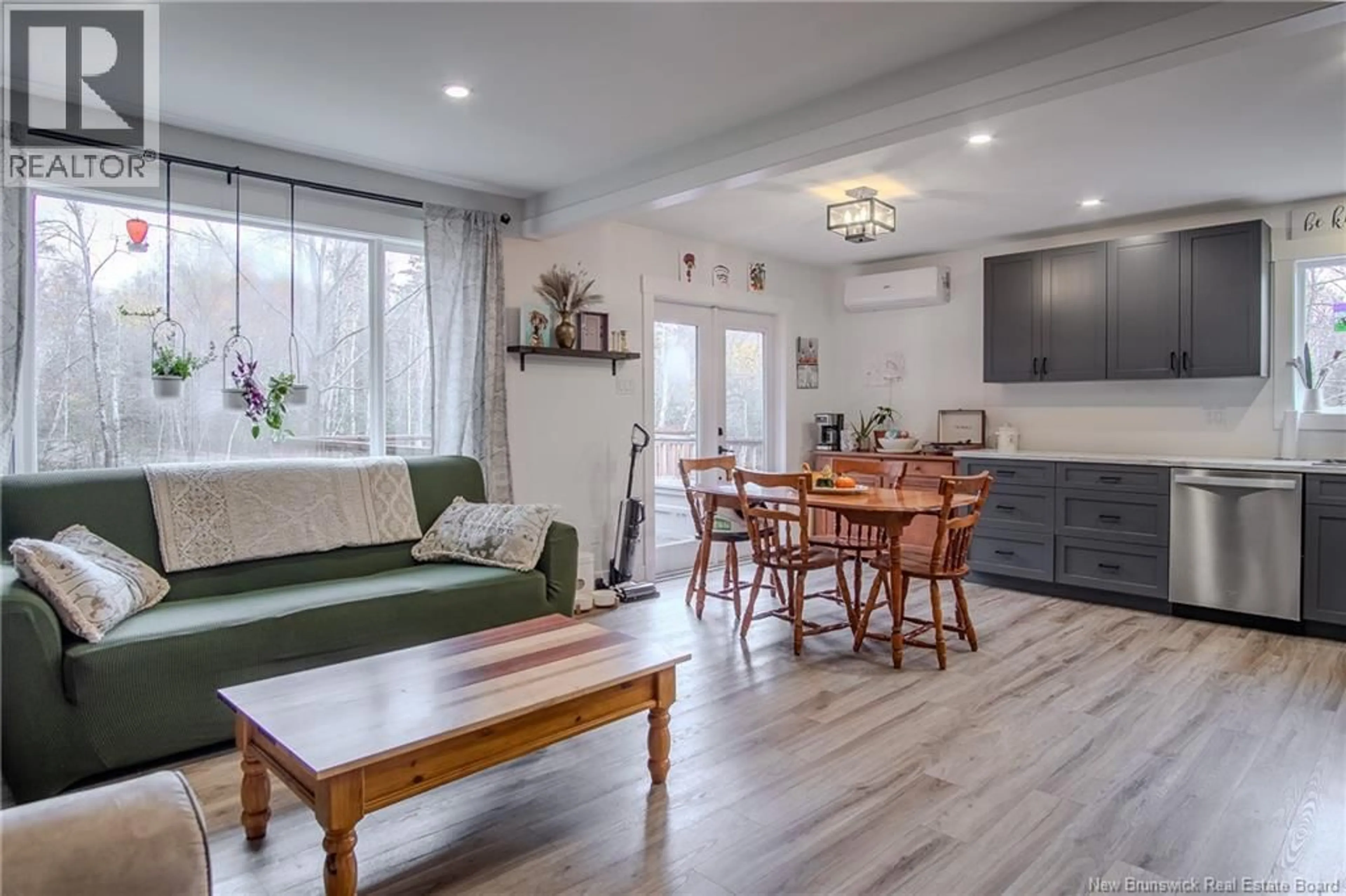 Open concept kitchen, wood/laminate floor for 75 OLD ROAD, Nauwigewauk New Brunswick E5N6X9