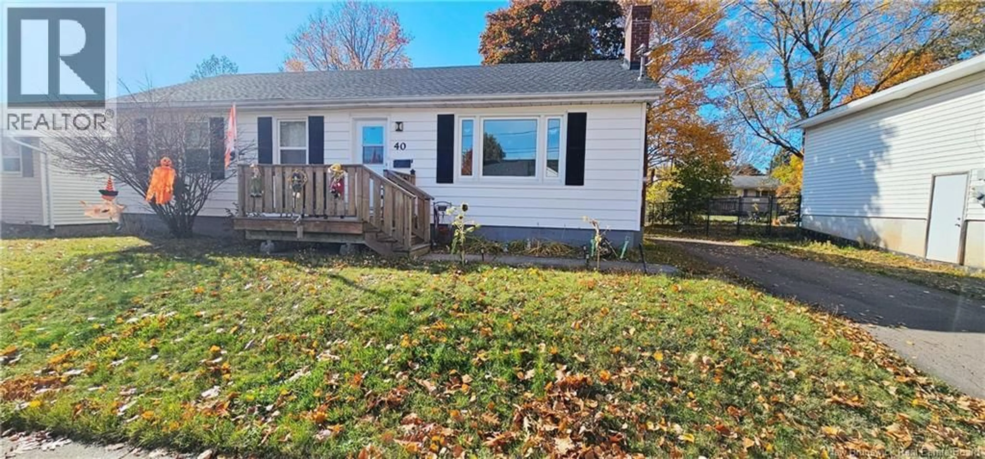 Home with vinyl exterior material, street for 40 CORONATION DRIVE, Moncton New Brunswick E1E2X1