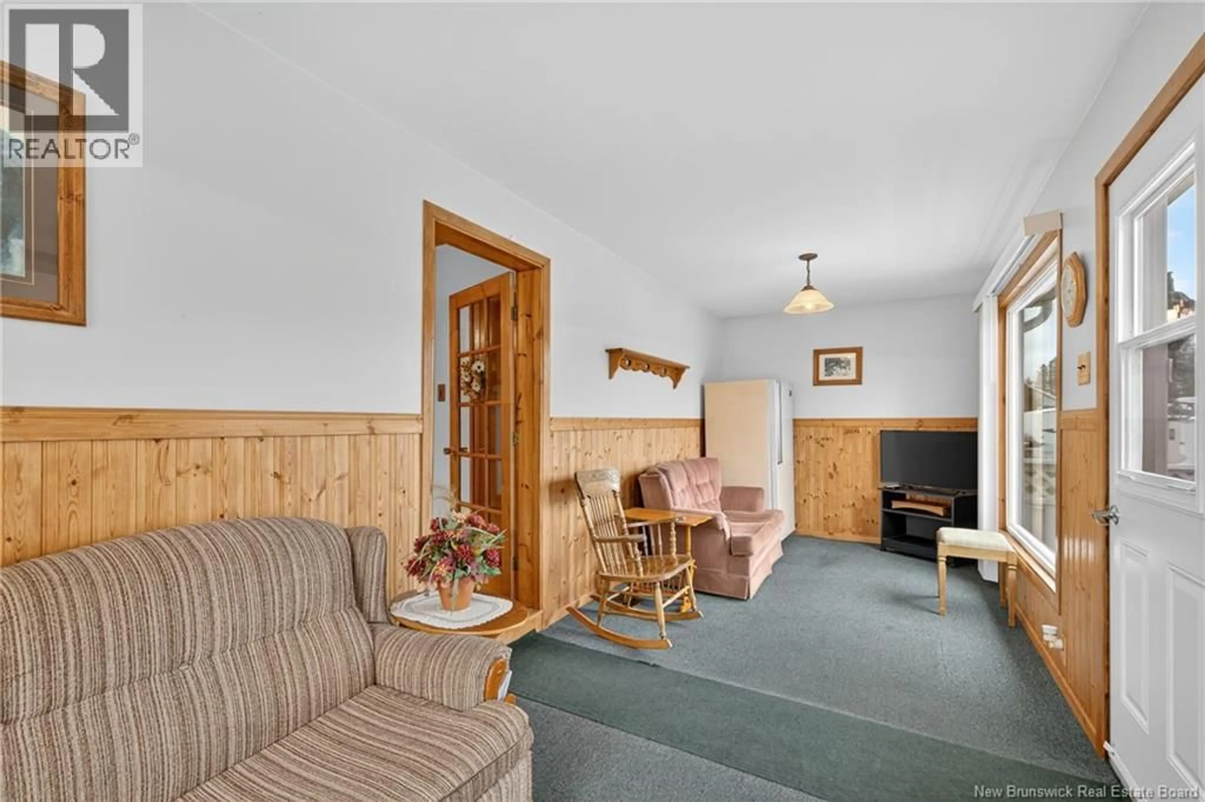 Living room with furniture, unknown for 10 BASIN STREET, Bathurst New Brunswick E2A6N2