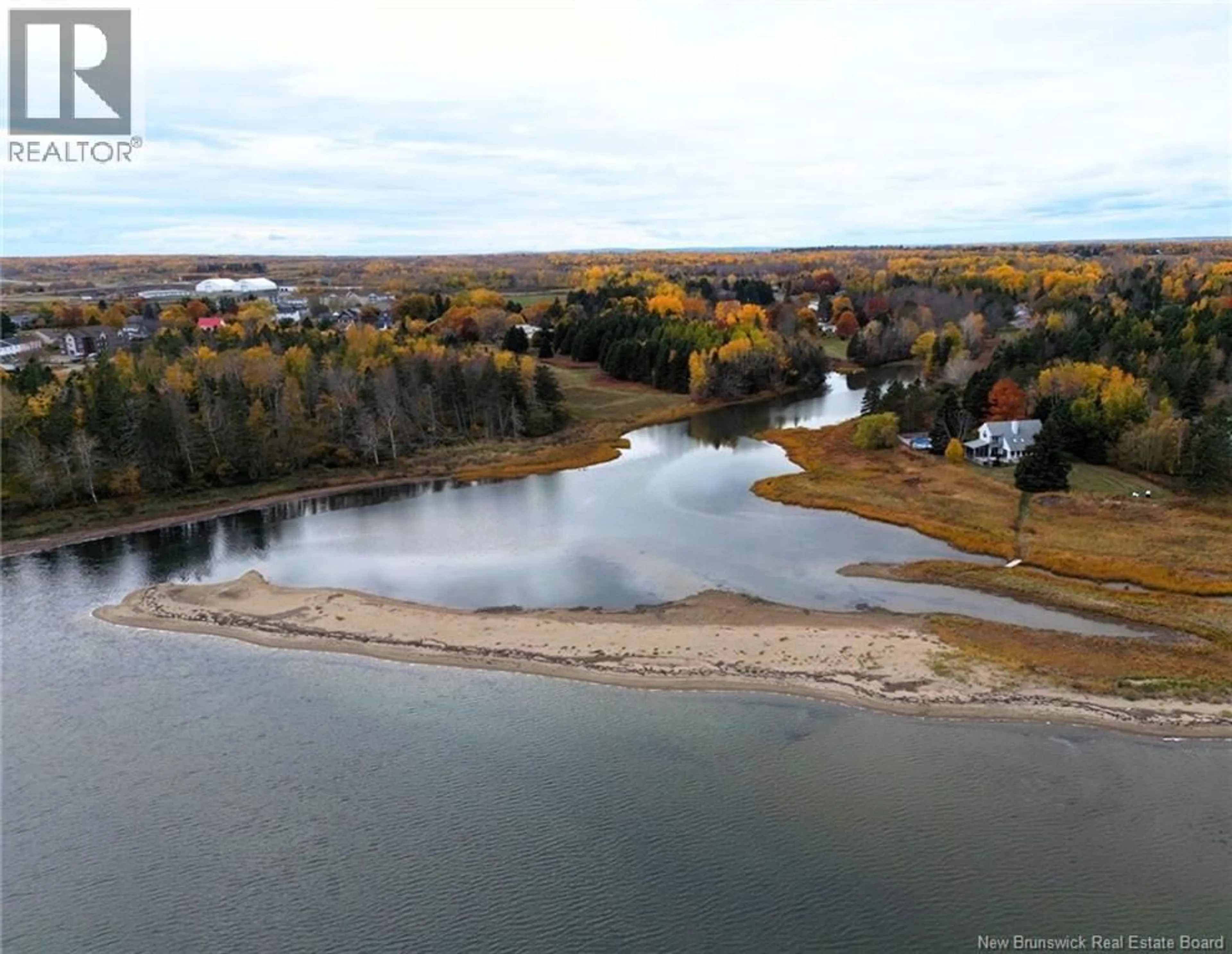 A pic from outside/outdoor area/front of a property/back of a property/a pic from drone, water/lake/river/ocean view for 48 HERON WAY, Shediac Cape New Brunswick E4P3C1
