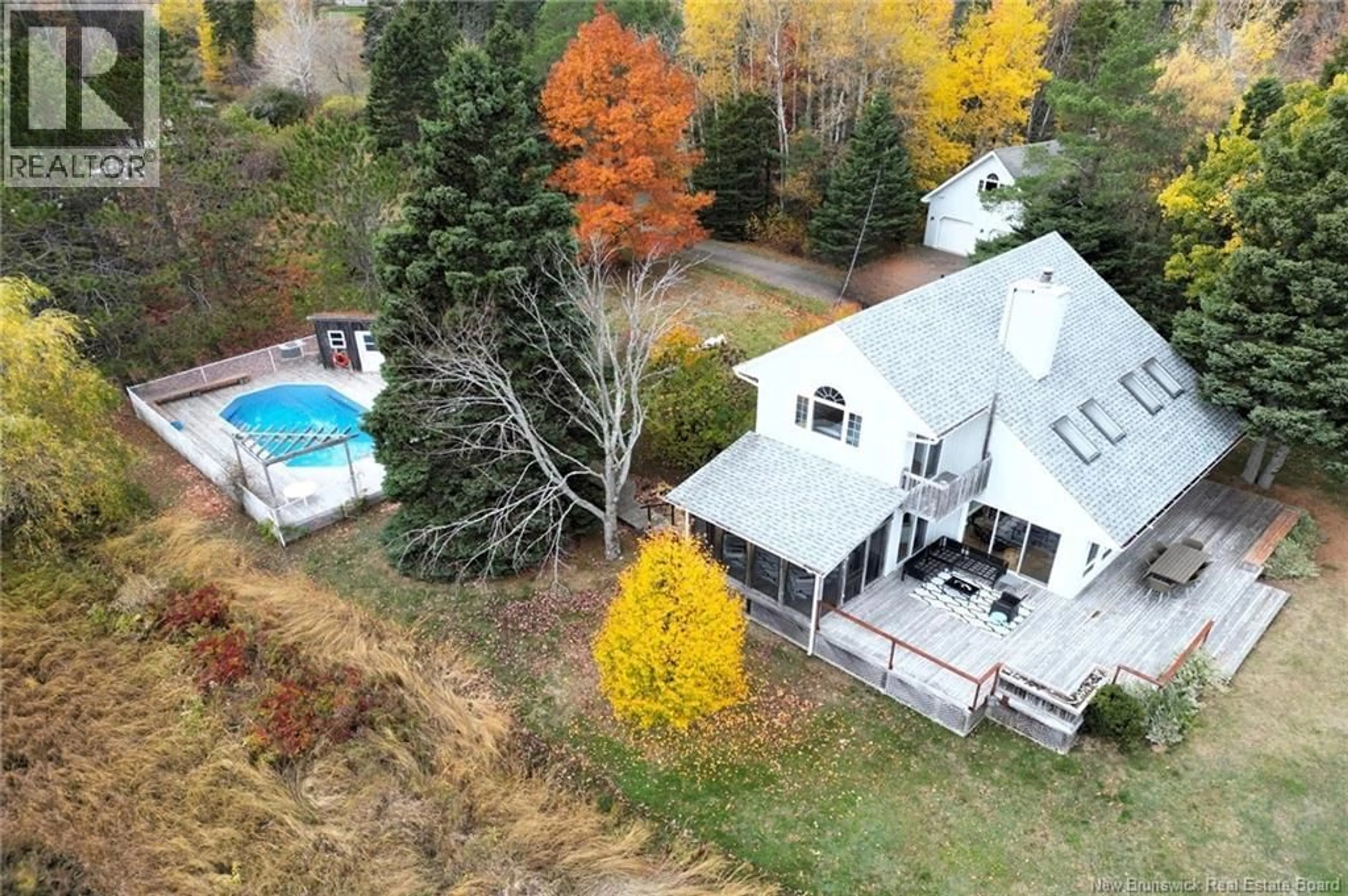 A pic from outside/outdoor area/front of a property/back of a property/a pic from drone, water/lake/river/ocean view for 48 HERON WAY, Shediac Cape New Brunswick E4P3C1