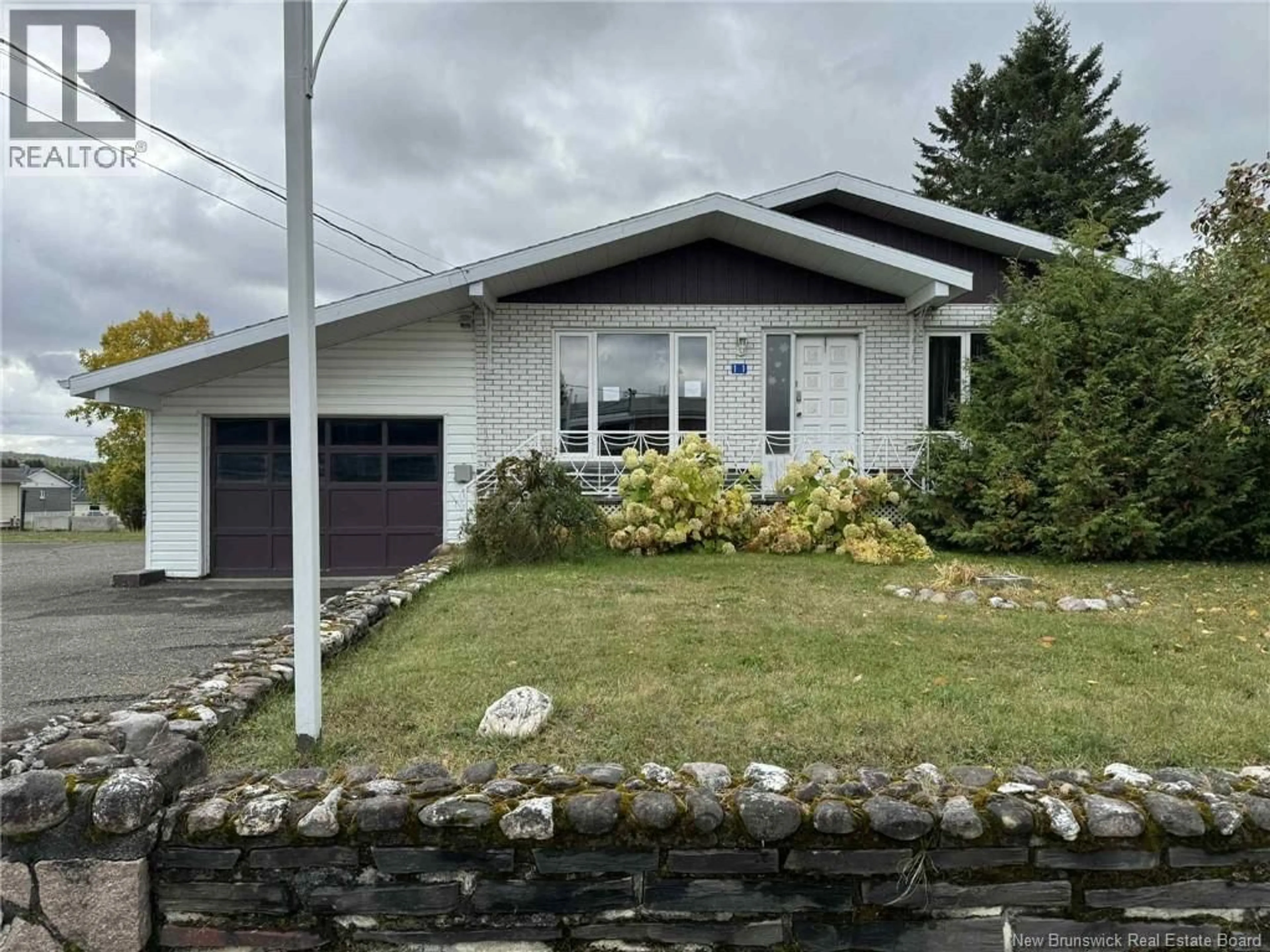 Home with vinyl exterior material, street for 11 RUE DE L'ECOLE STREET, Kedgwick New Brunswick E8B1E4