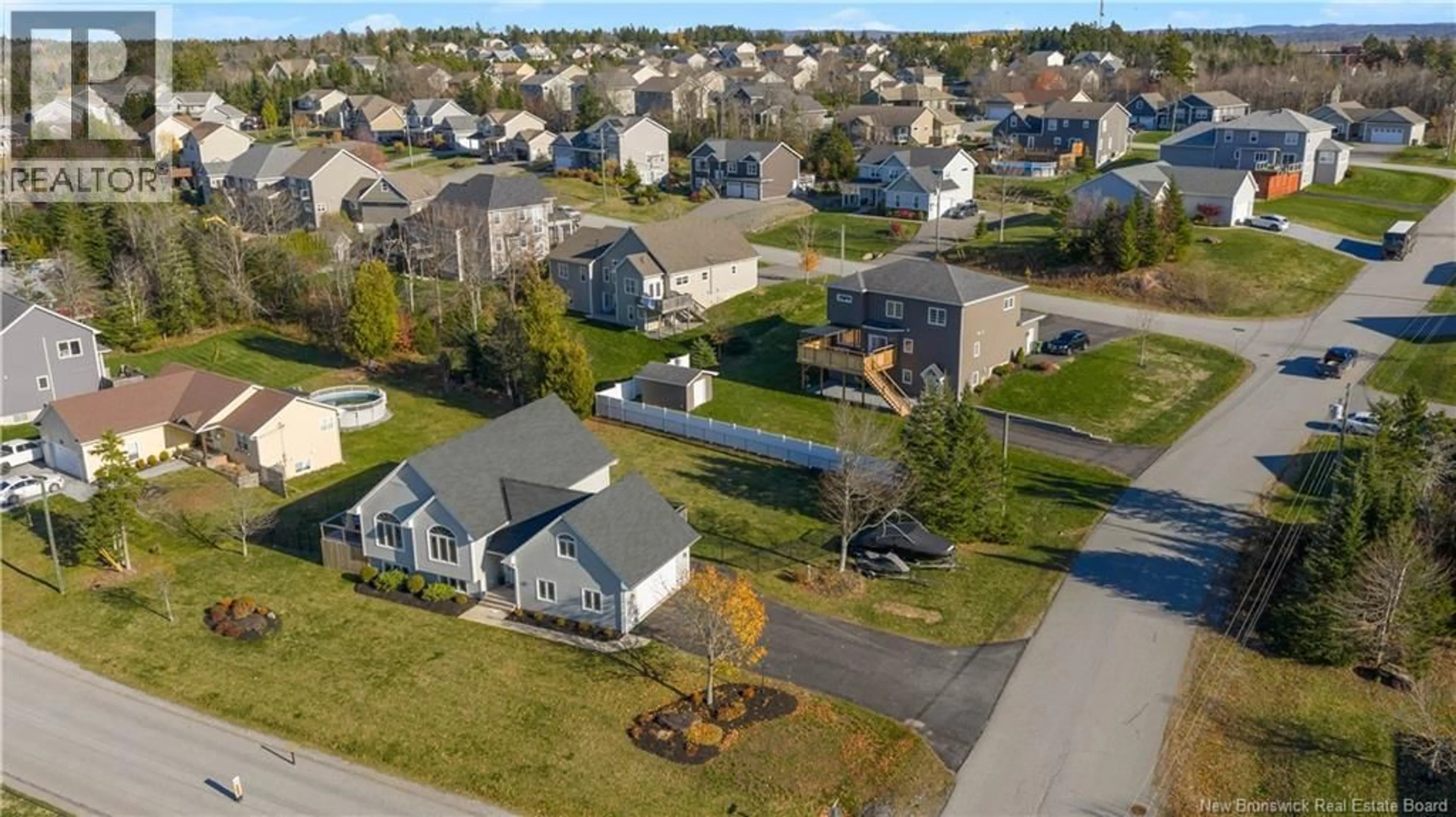 A pic from outside/outdoor area/front of a property/back of a property/a pic from drone, street for 102 QUEENSBURY DRIVE, Quispamsis New Brunswick E2E0H7