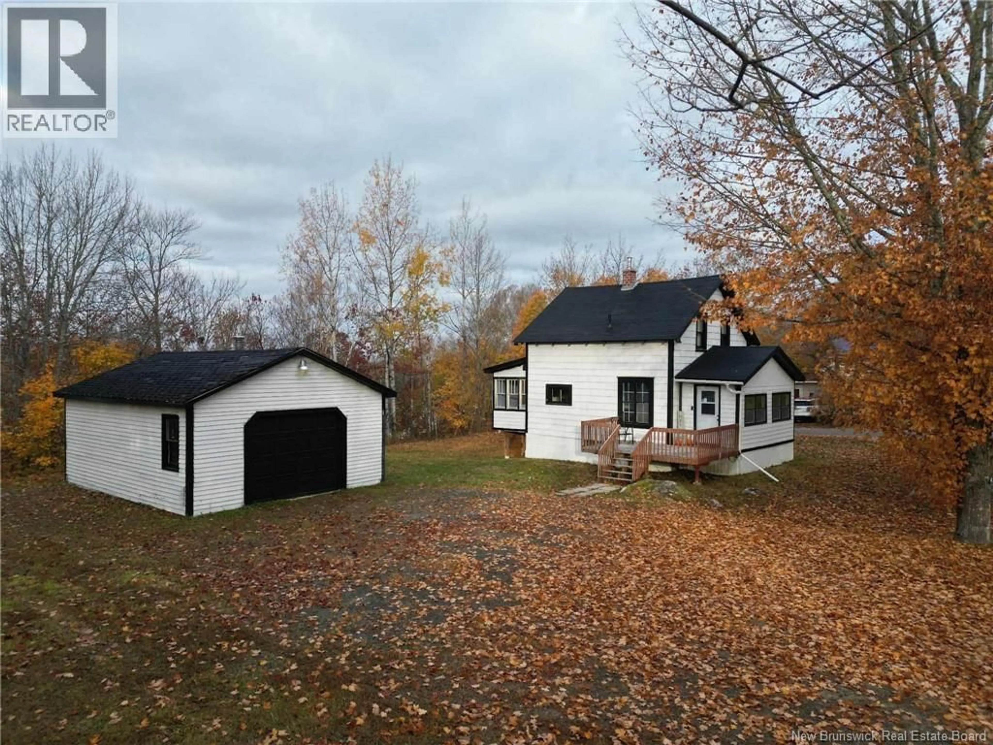 A pic from outside/outdoor area/front of a property/back of a property/a pic from drone, street for 54 PLEASANT AVENUE, McAdam New Brunswick E6J1G4