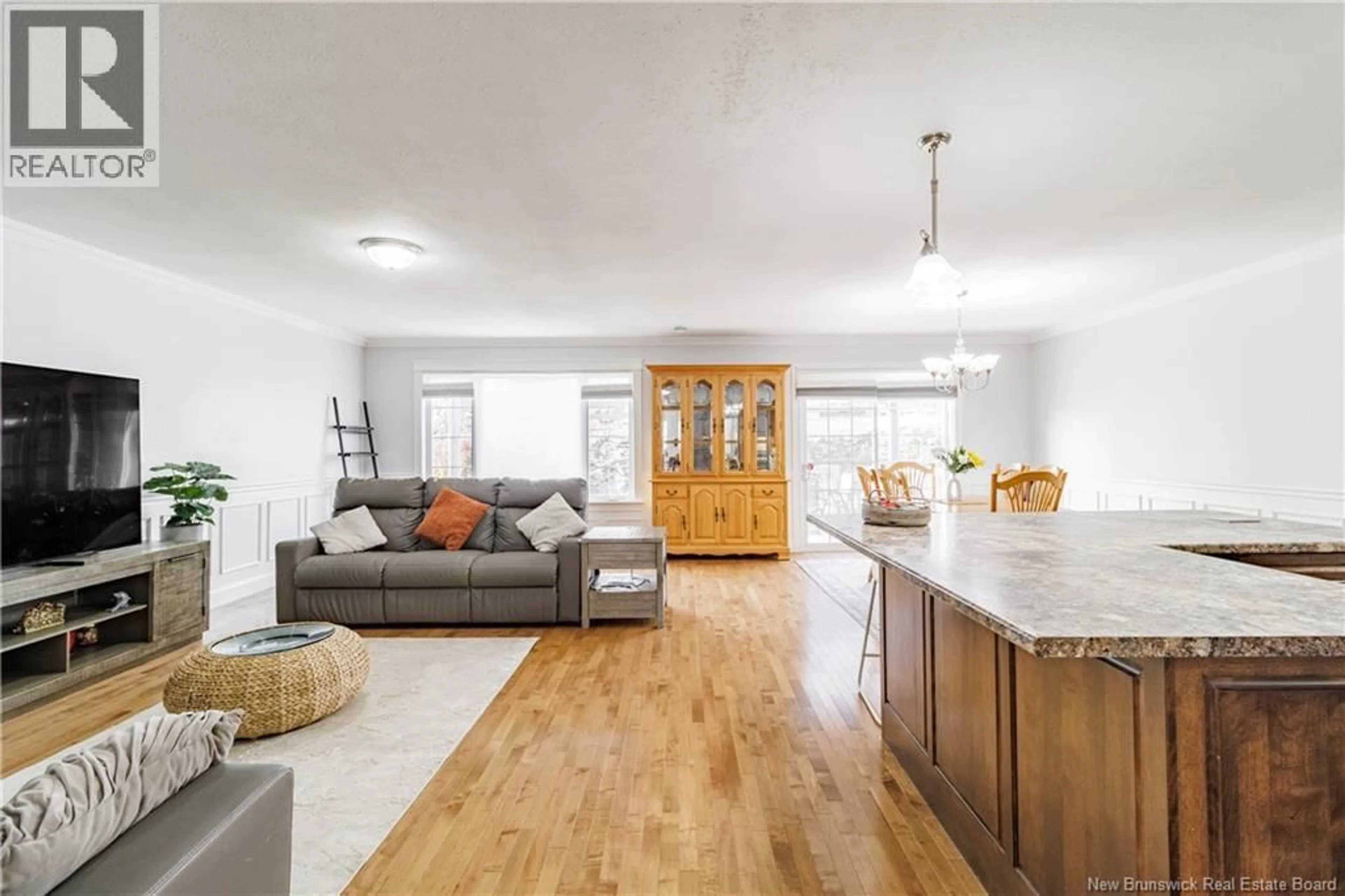 Open concept kitchen, wood/laminate floor for 99 RIDGELINE CRESCENT, Hanwell New Brunswick E3C0E9