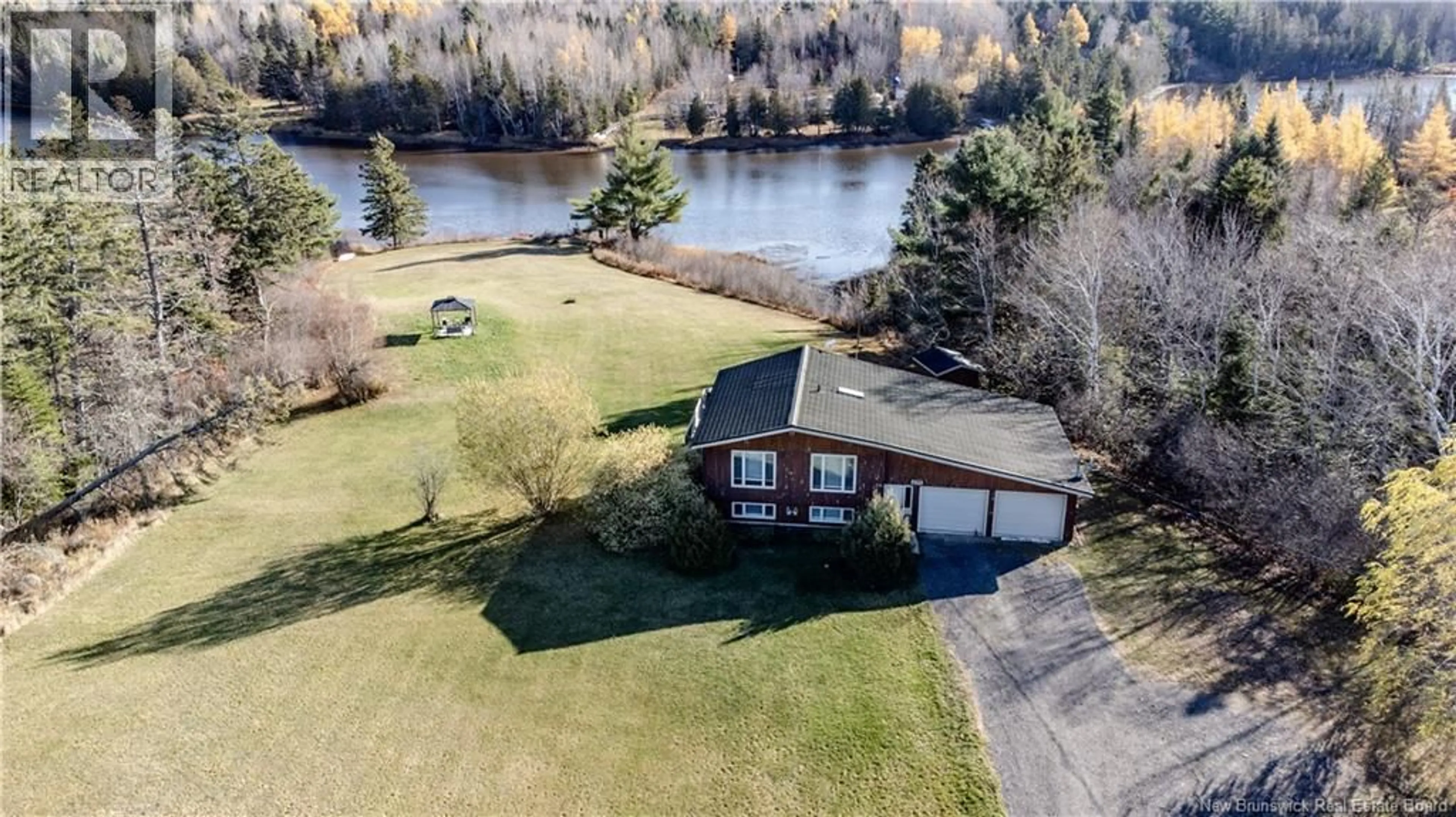 A pic from outside/outdoor area/front of a property/back of a property/a pic from drone, water/lake/river/ocean view for 699 SAINT CHARLES NORD ROAD, Saint-Charles New Brunswick E4W4R9