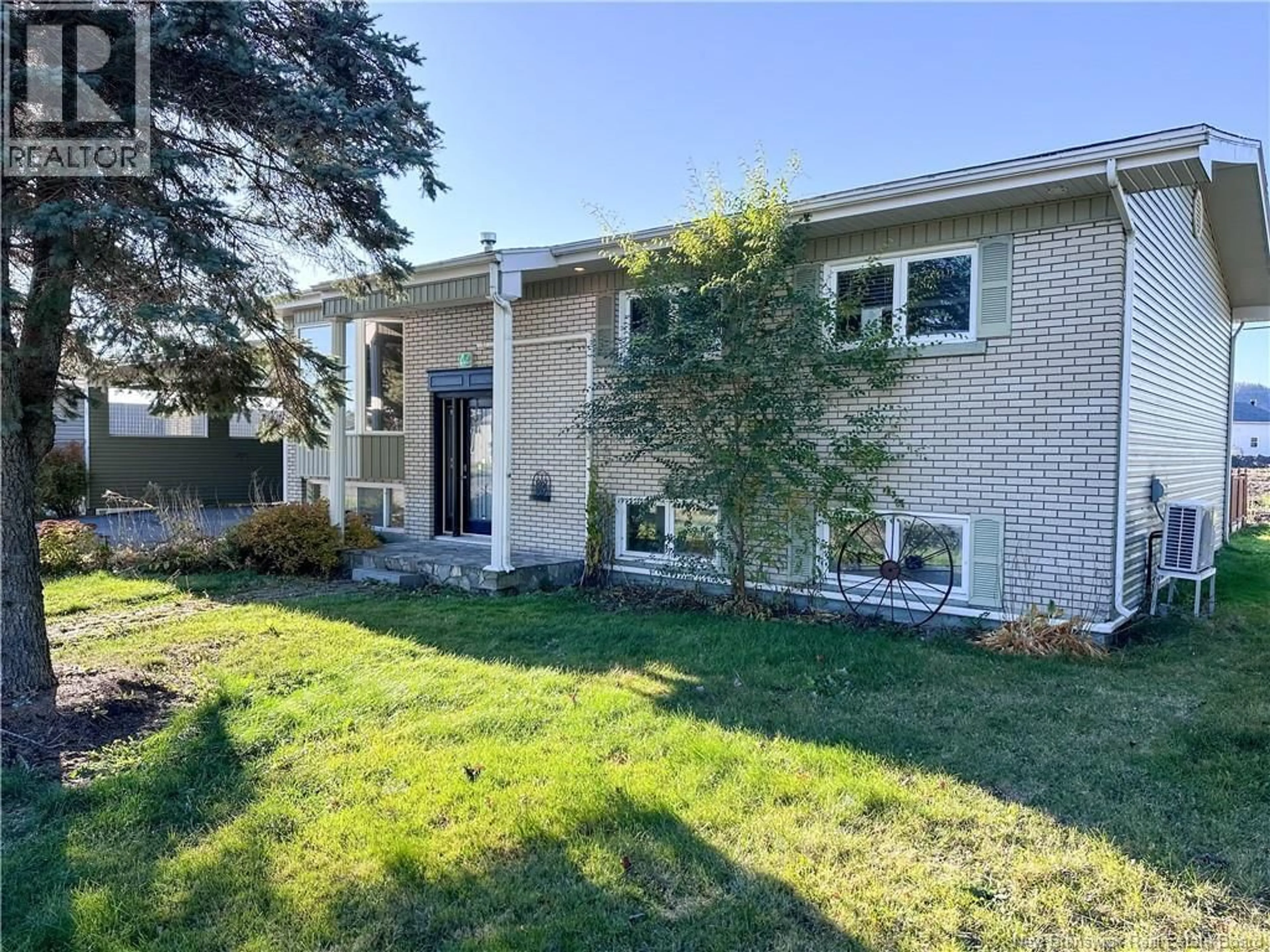 Home with brick exterior material, street for 44 LIONEL H LAJOIE AVENUE, Edmundston New Brunswick E3V3G6