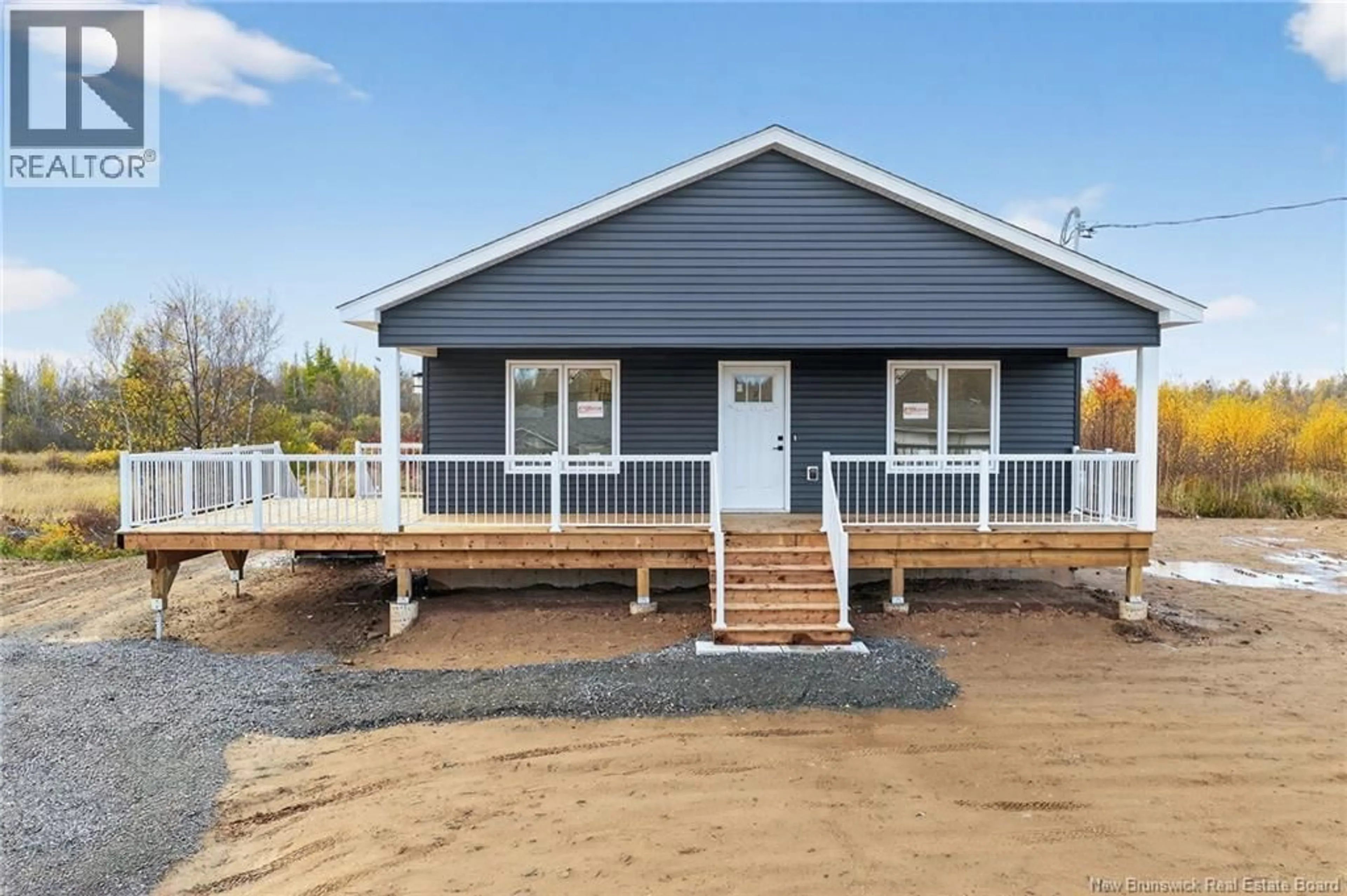 Home with vinyl exterior material, street for 42 PARKER ROAD, Scoudouc New Brunswick E4P3P9